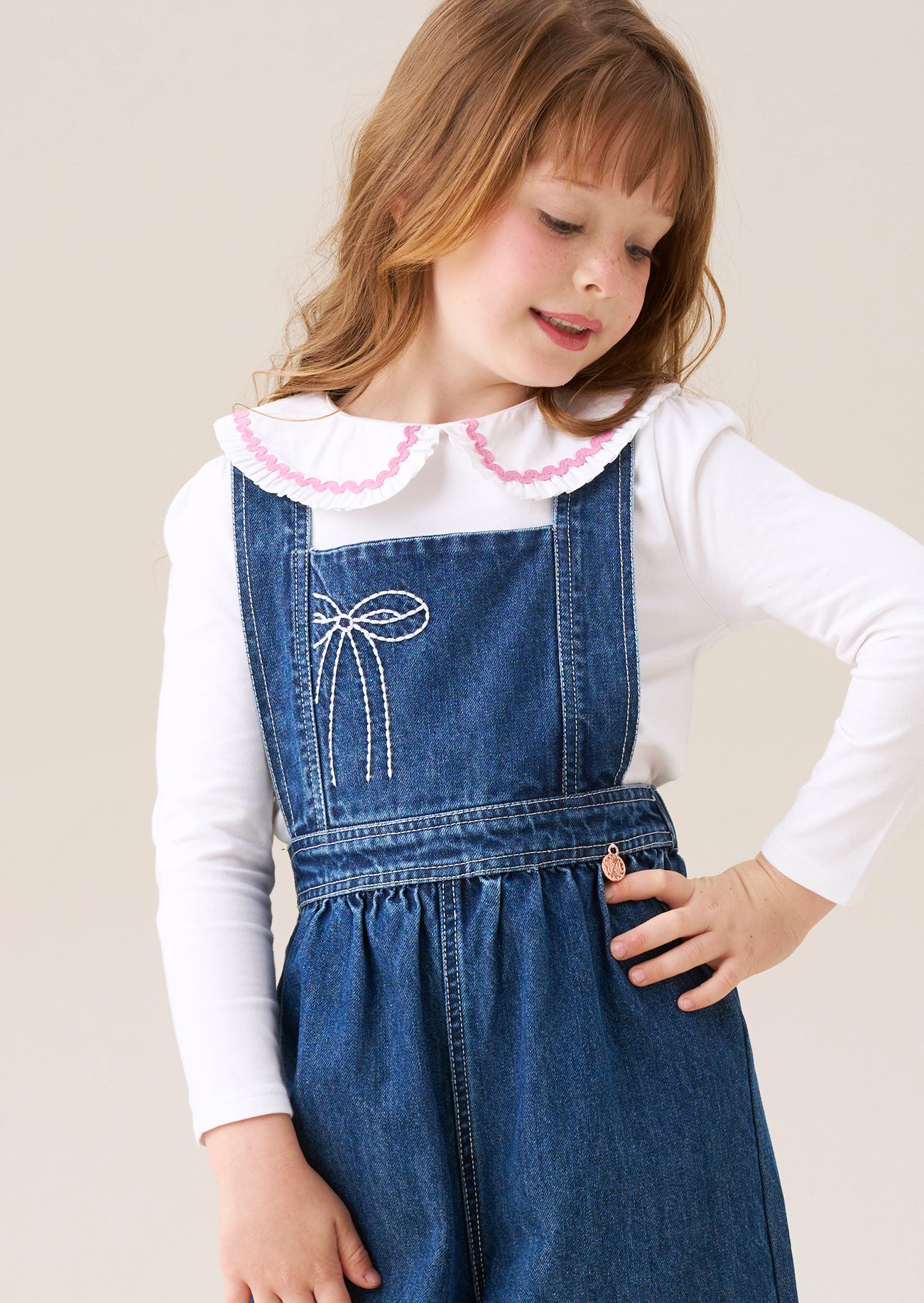 Top de manga larga con cuello Trinity