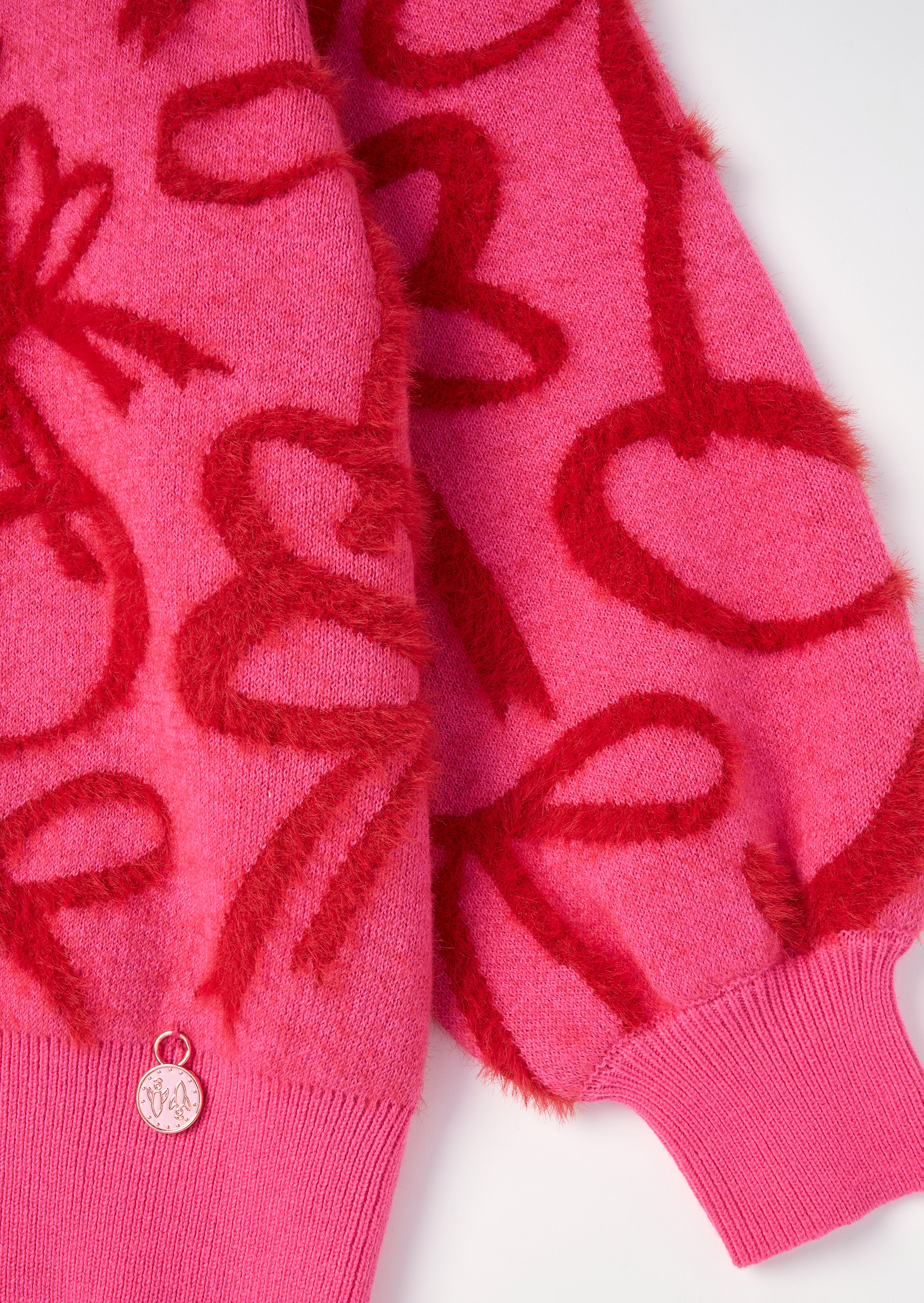 Livia Bow Sweter z Rzęsami
