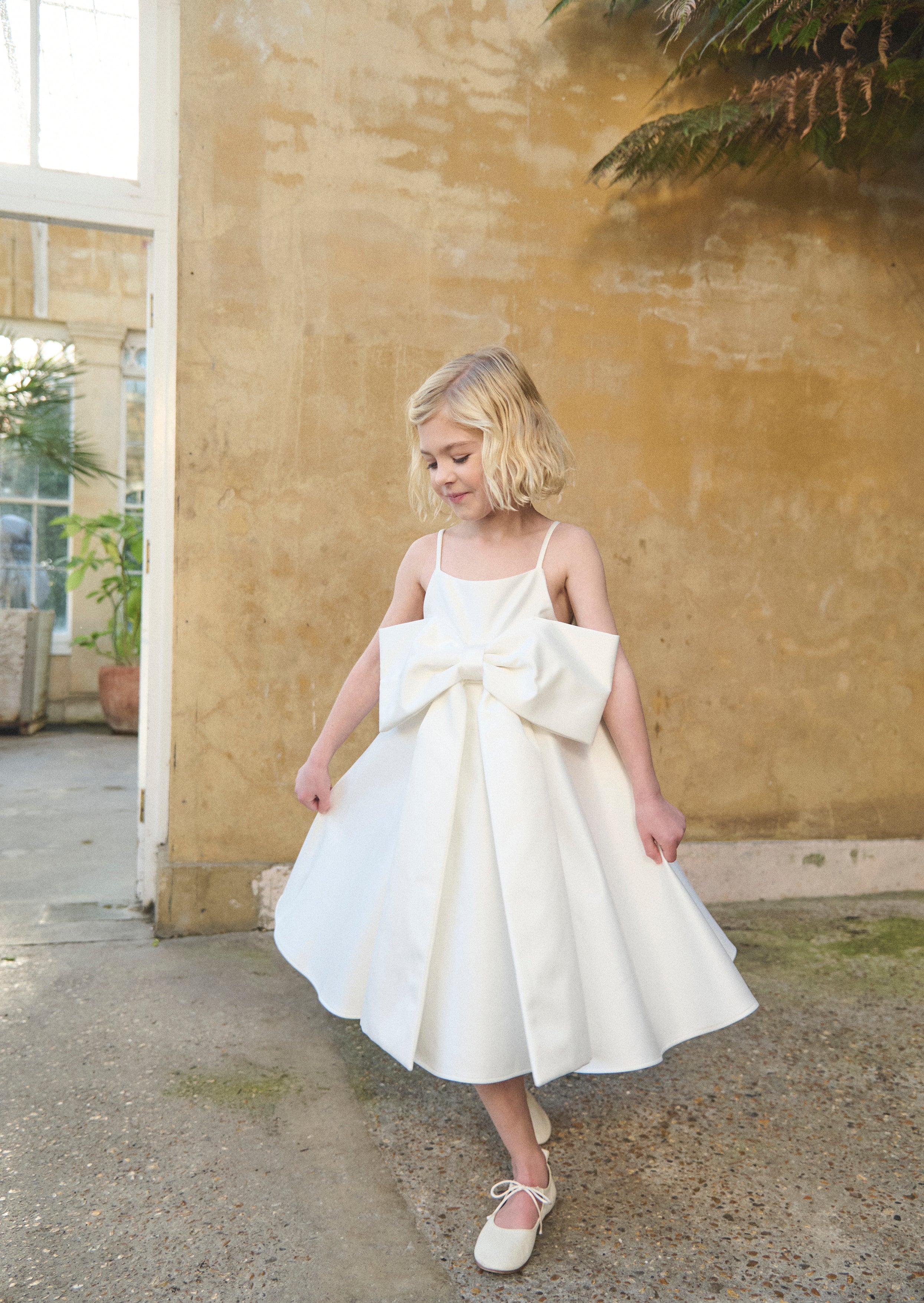 Vestito Gabriella con pieghe a fiocco