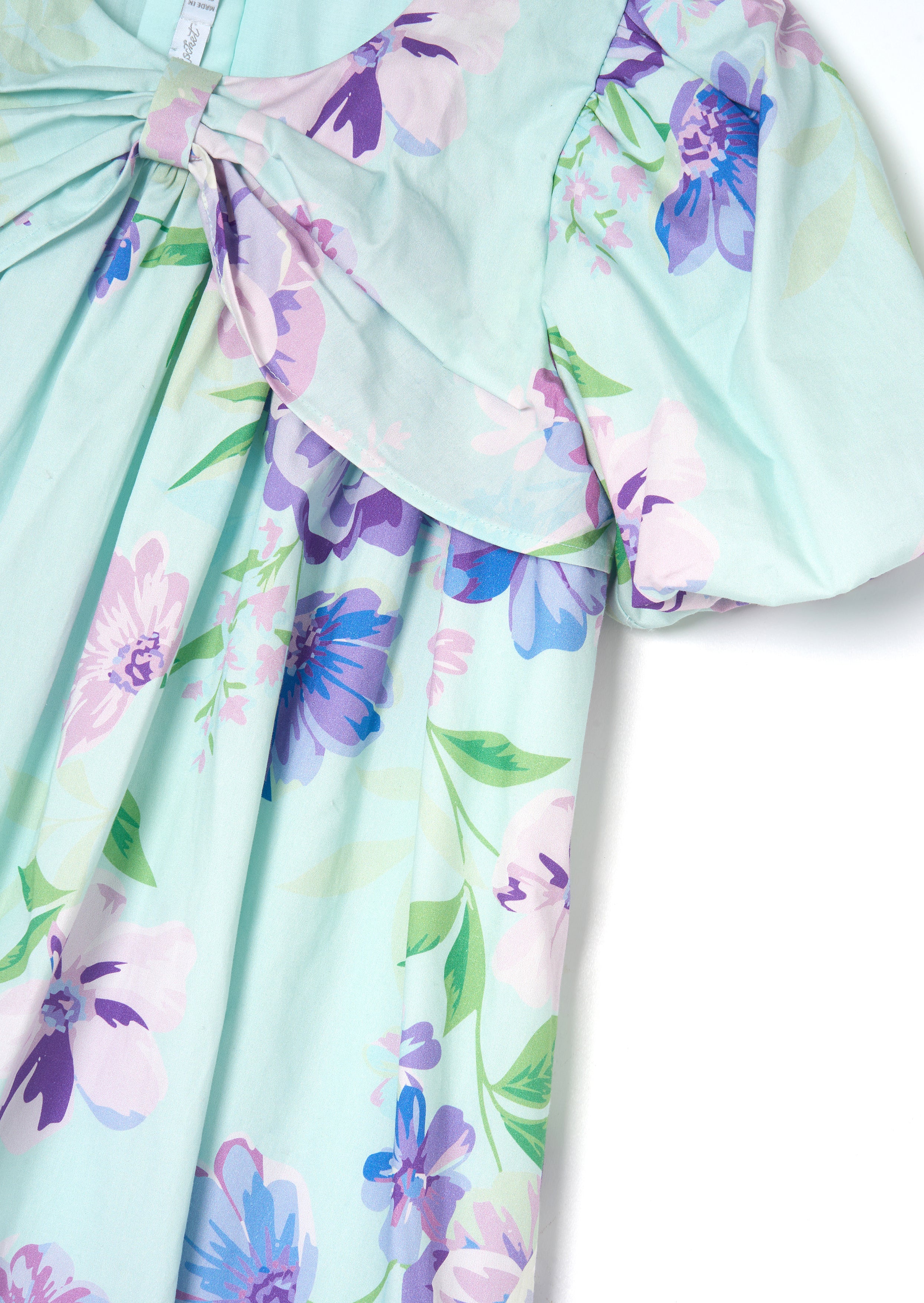 Robe Lucia à manches bouffantes avec nœud devant