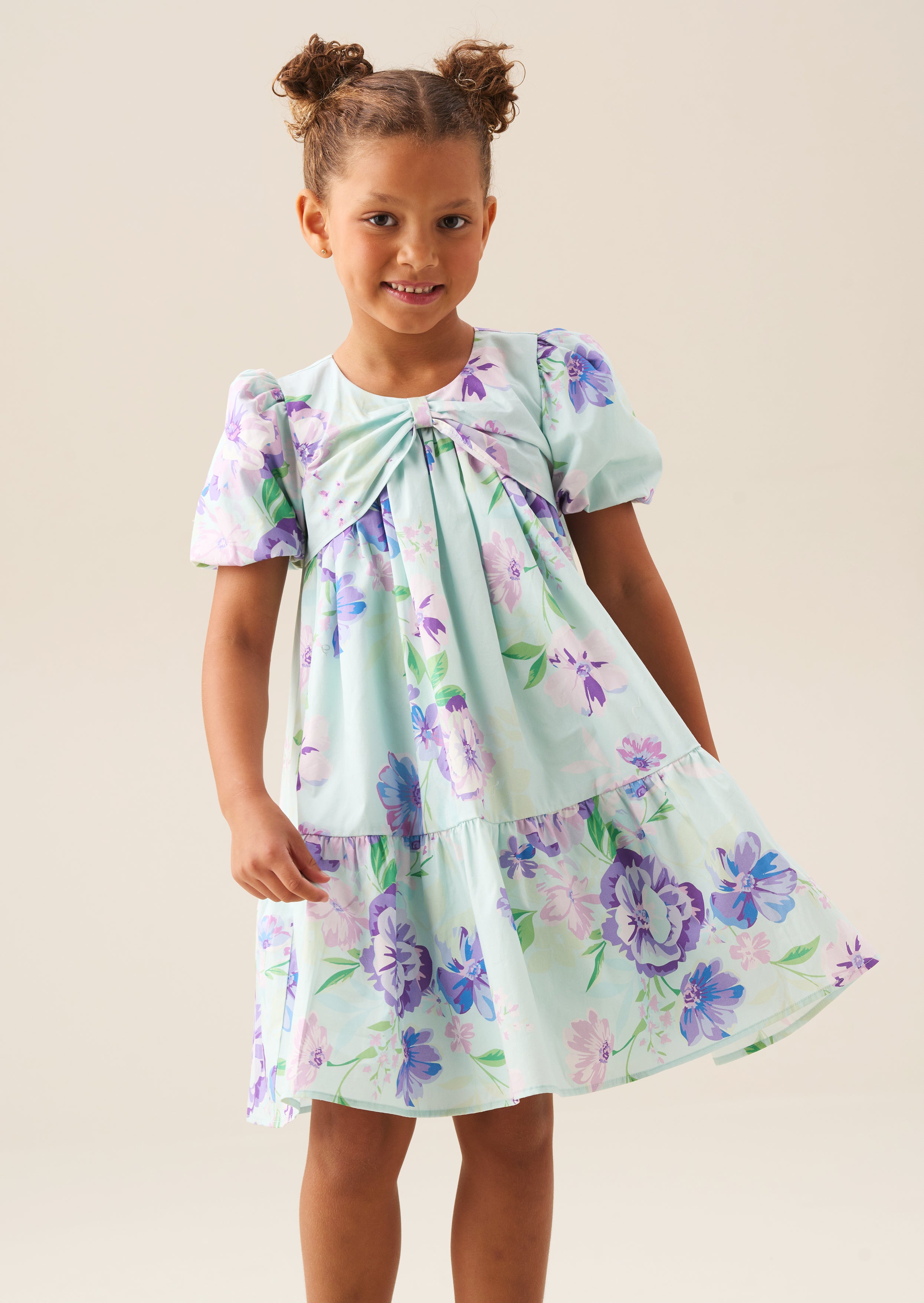 Robe Lucia à manches bouffantes avec nœud devant