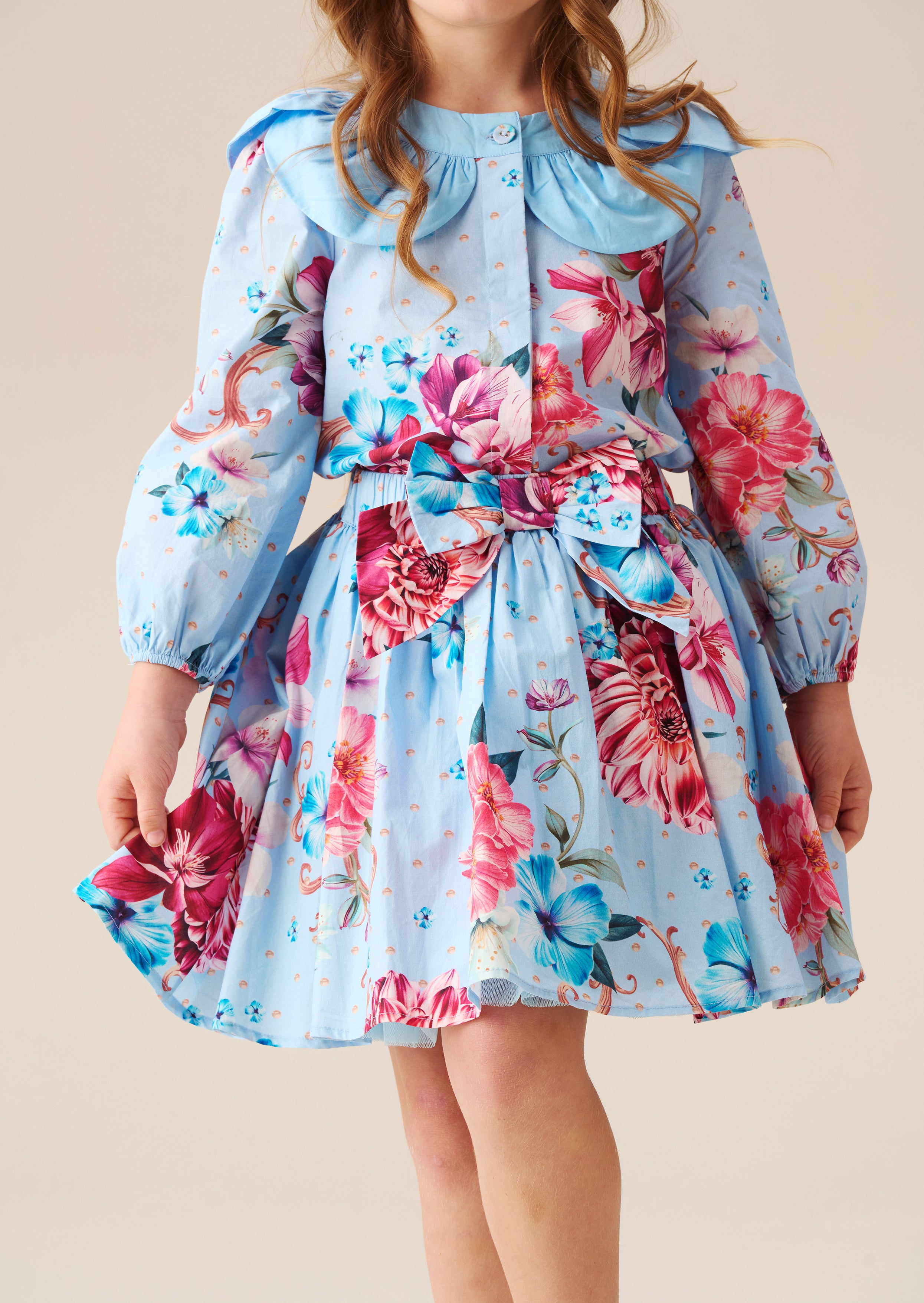 تنورة دارسي بلو برينت بقوس عند الخصر