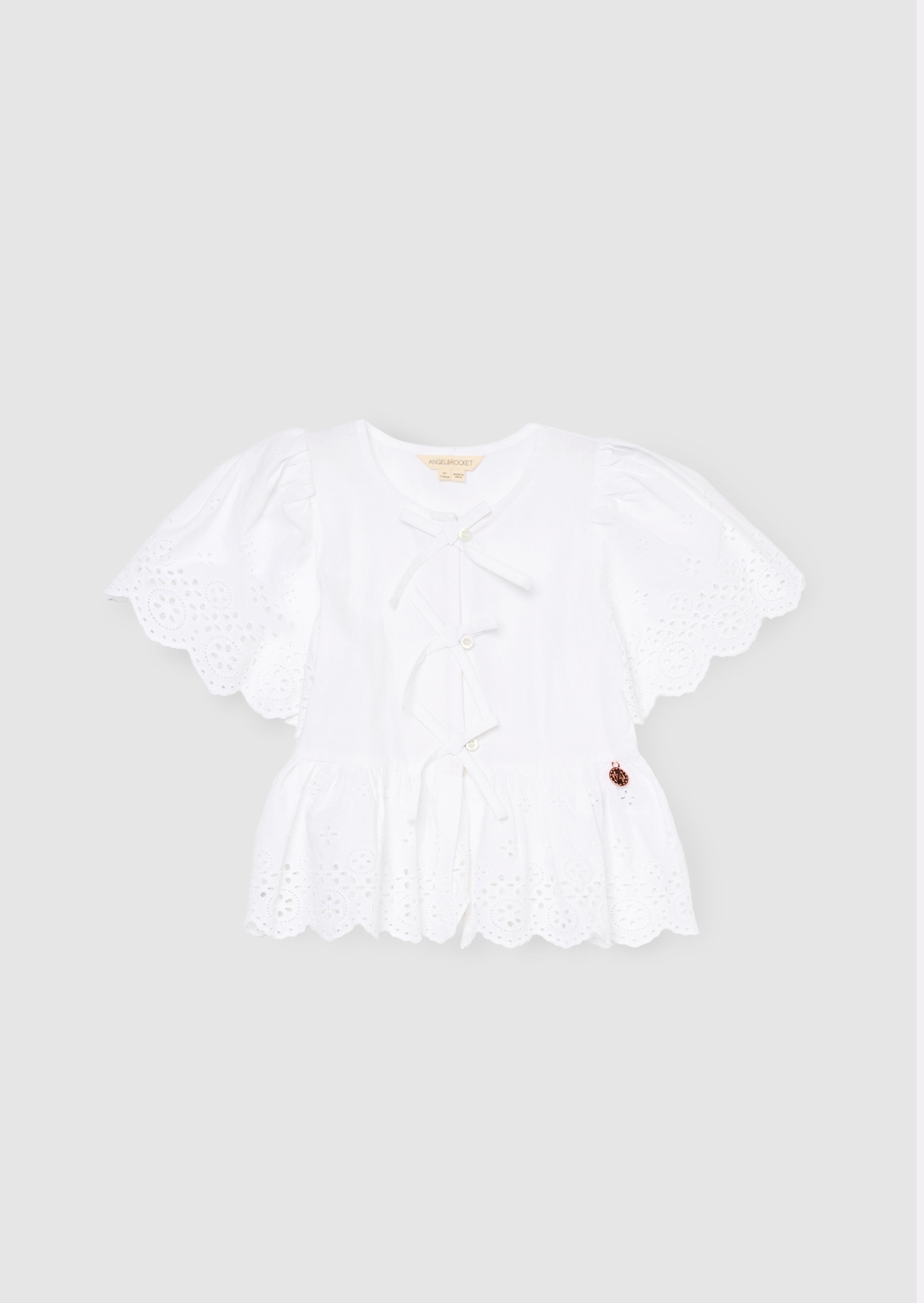 Ria Broderie Tie Front Peplum Top