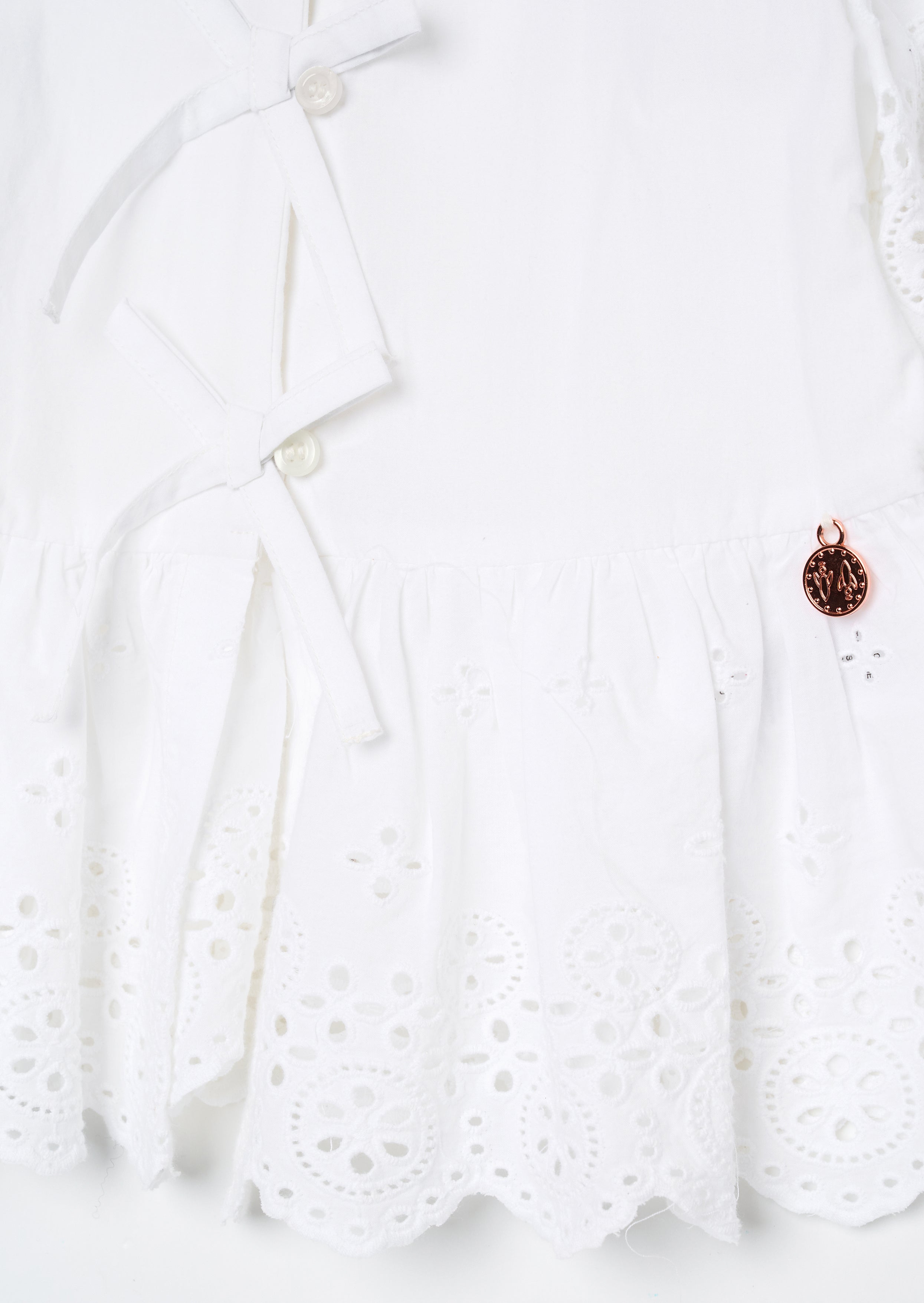 Ria Broderie Tie Front Peplum Top