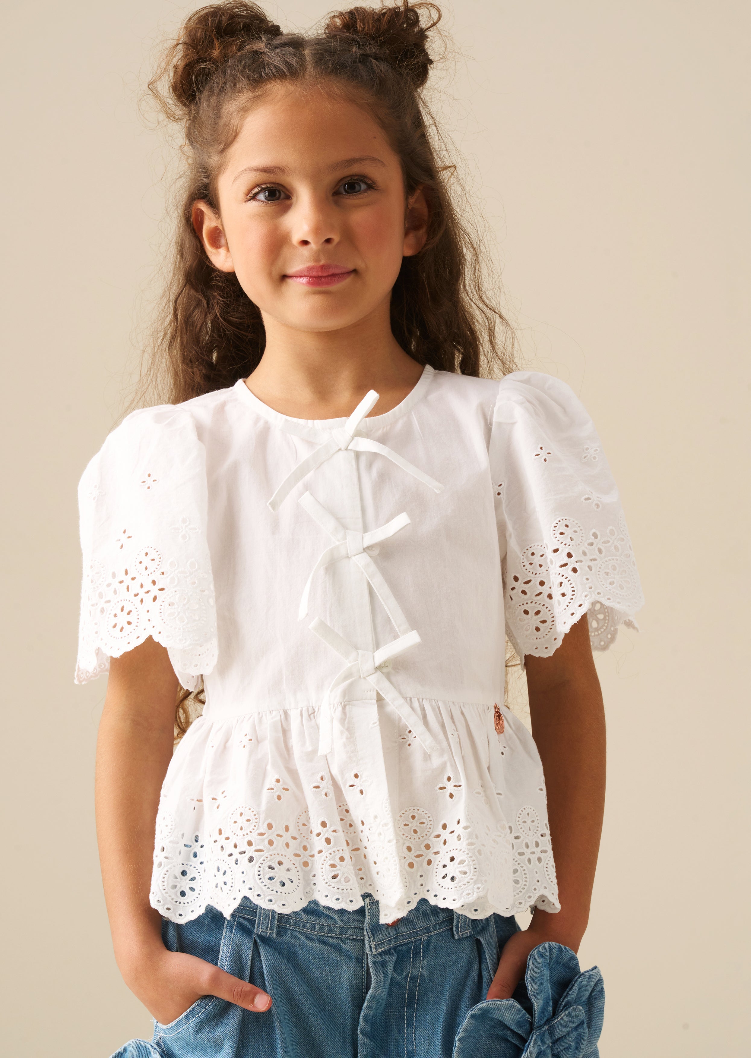 Ria Broderie Tie Front Peplum Top