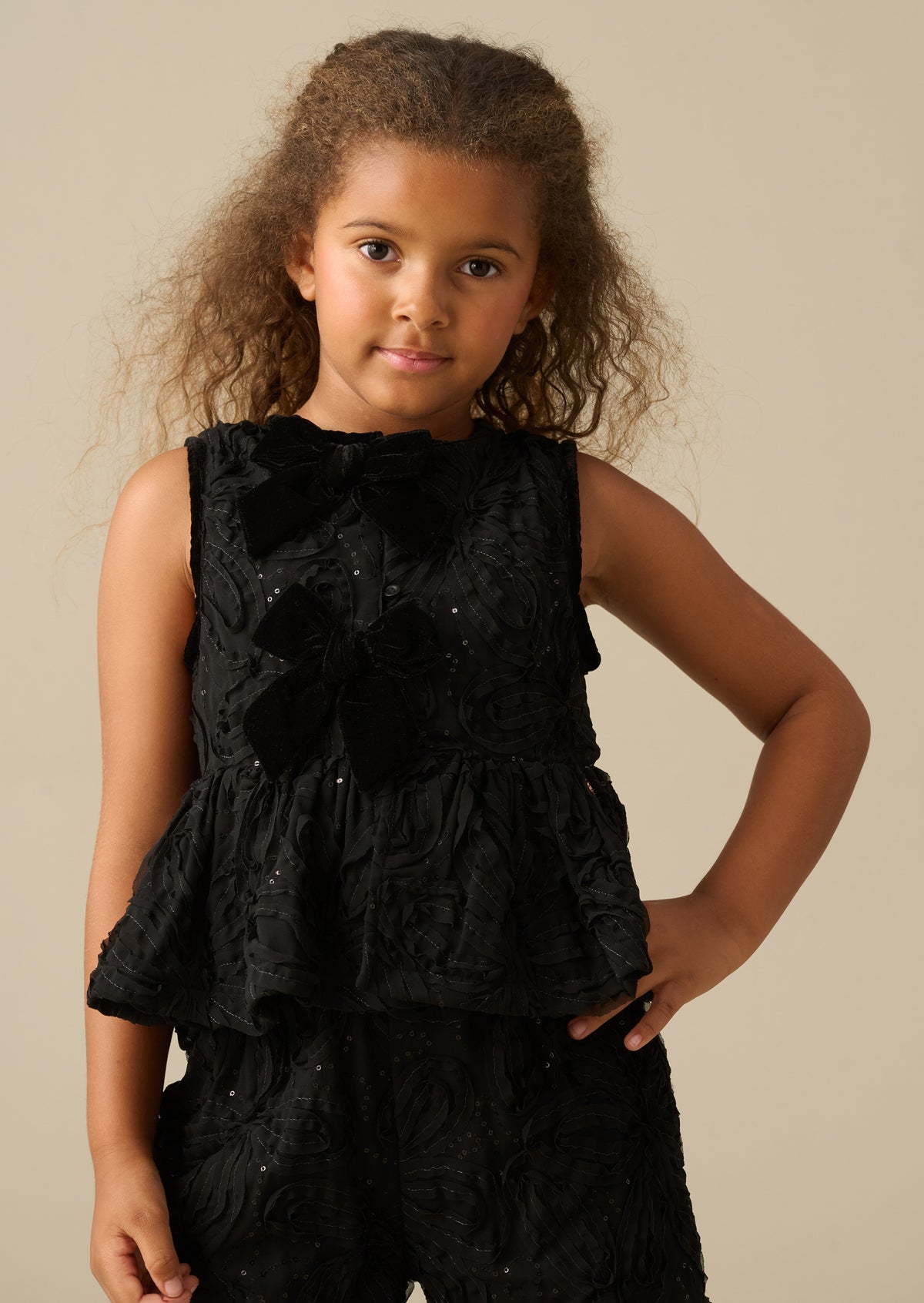 Mara Embellished Bow Peplum Top