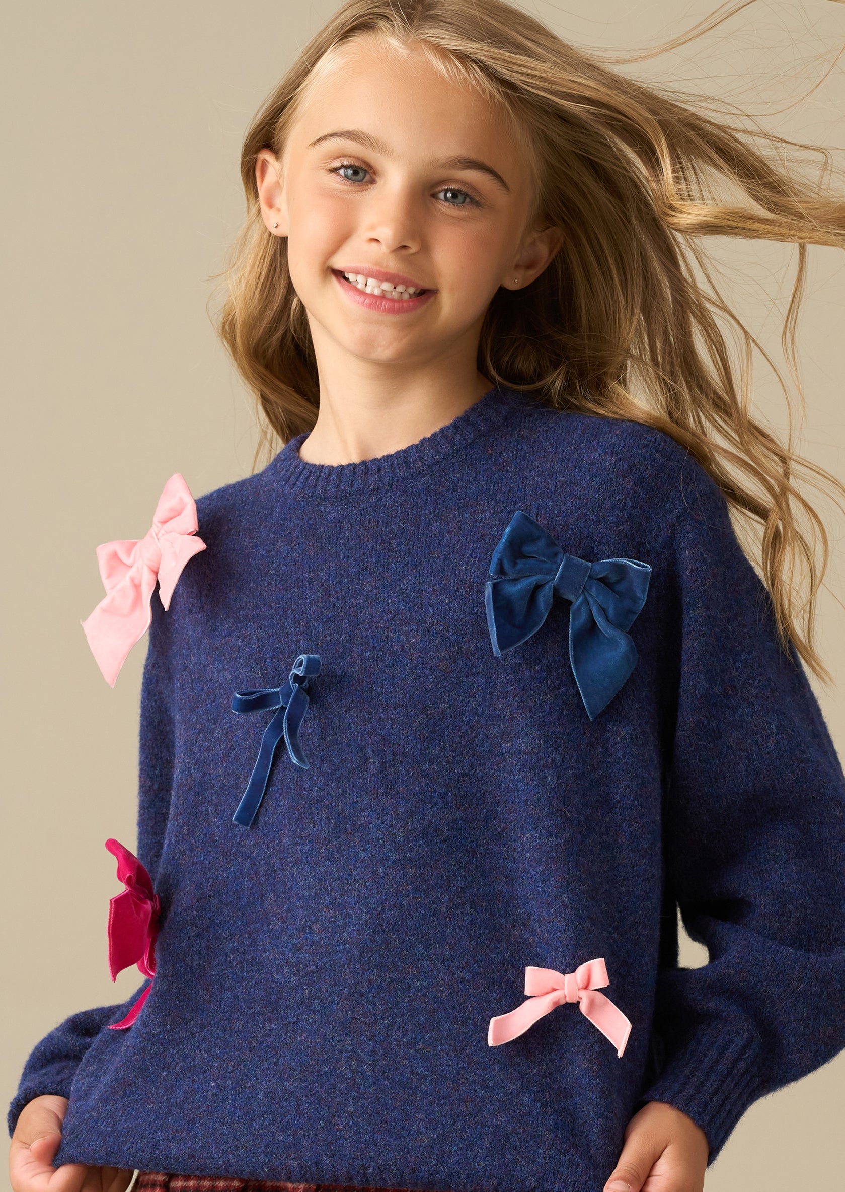 Freya blauer Strickpullover mit durchgehendem Schleifenmuster