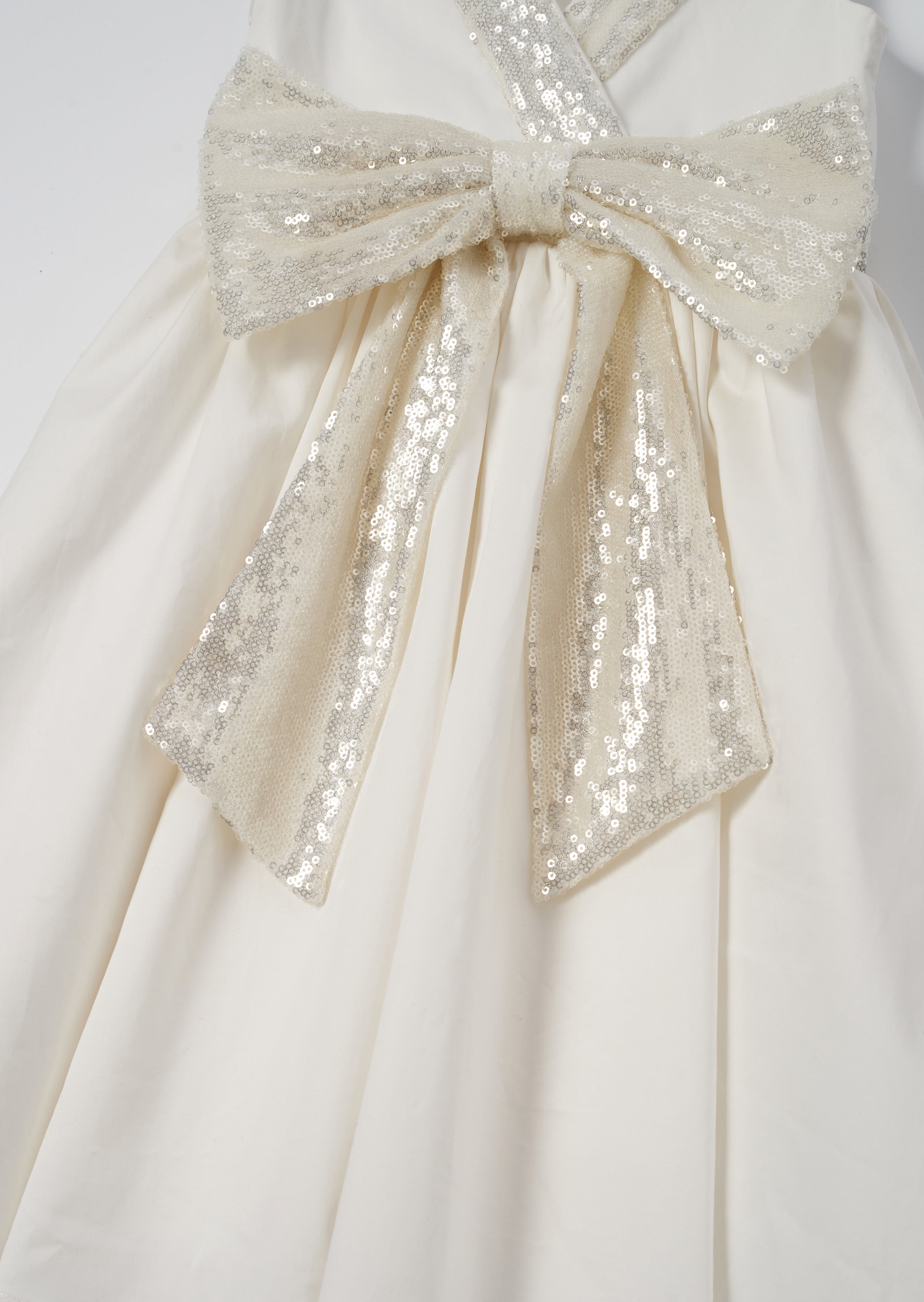 Vestito Claudia avorio con fiocco di paillettes