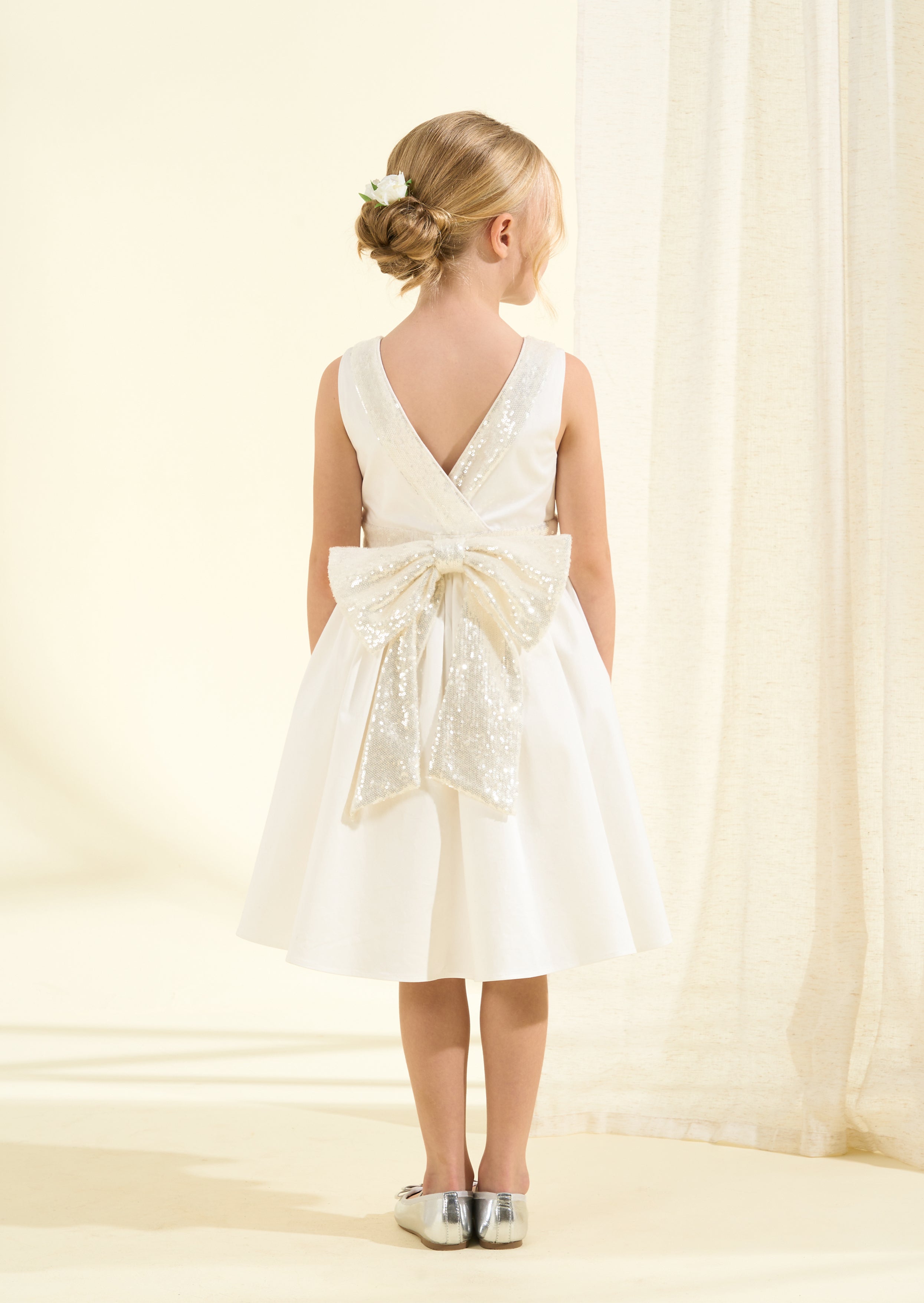 Vestito Claudia avorio con fiocco di paillettes