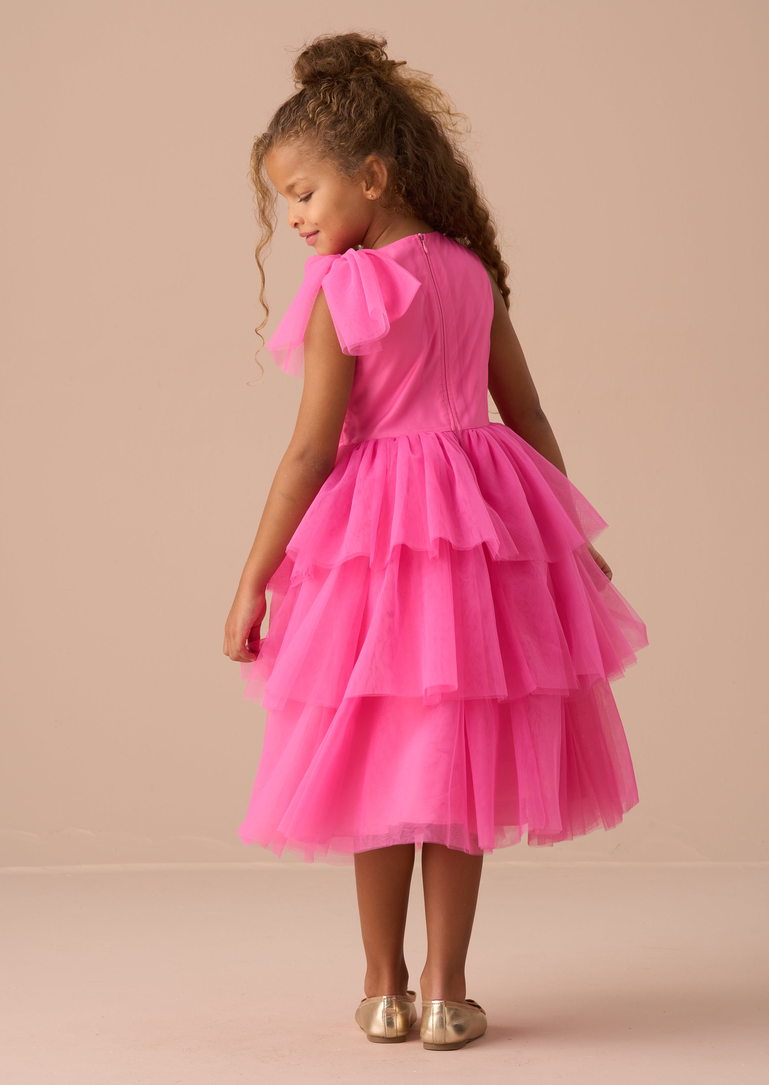 Vestido de malla con volantes y lazo rosa Sienna
