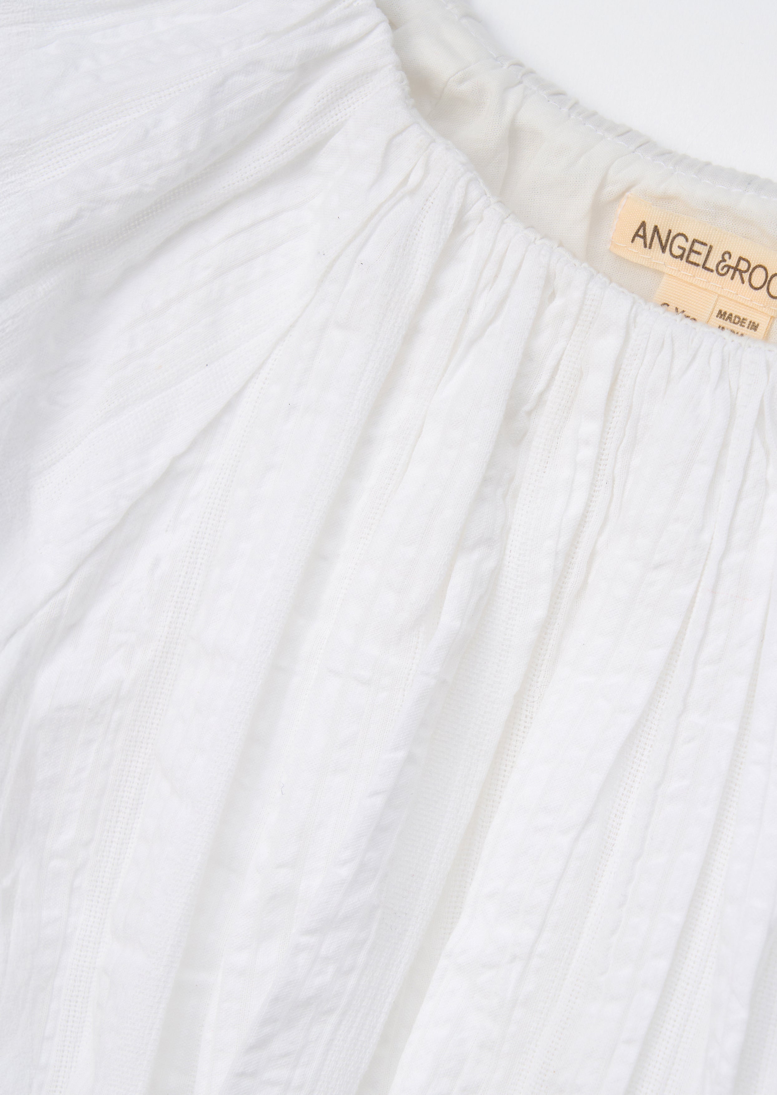 Top Michela blanco con dobladillo burbuja