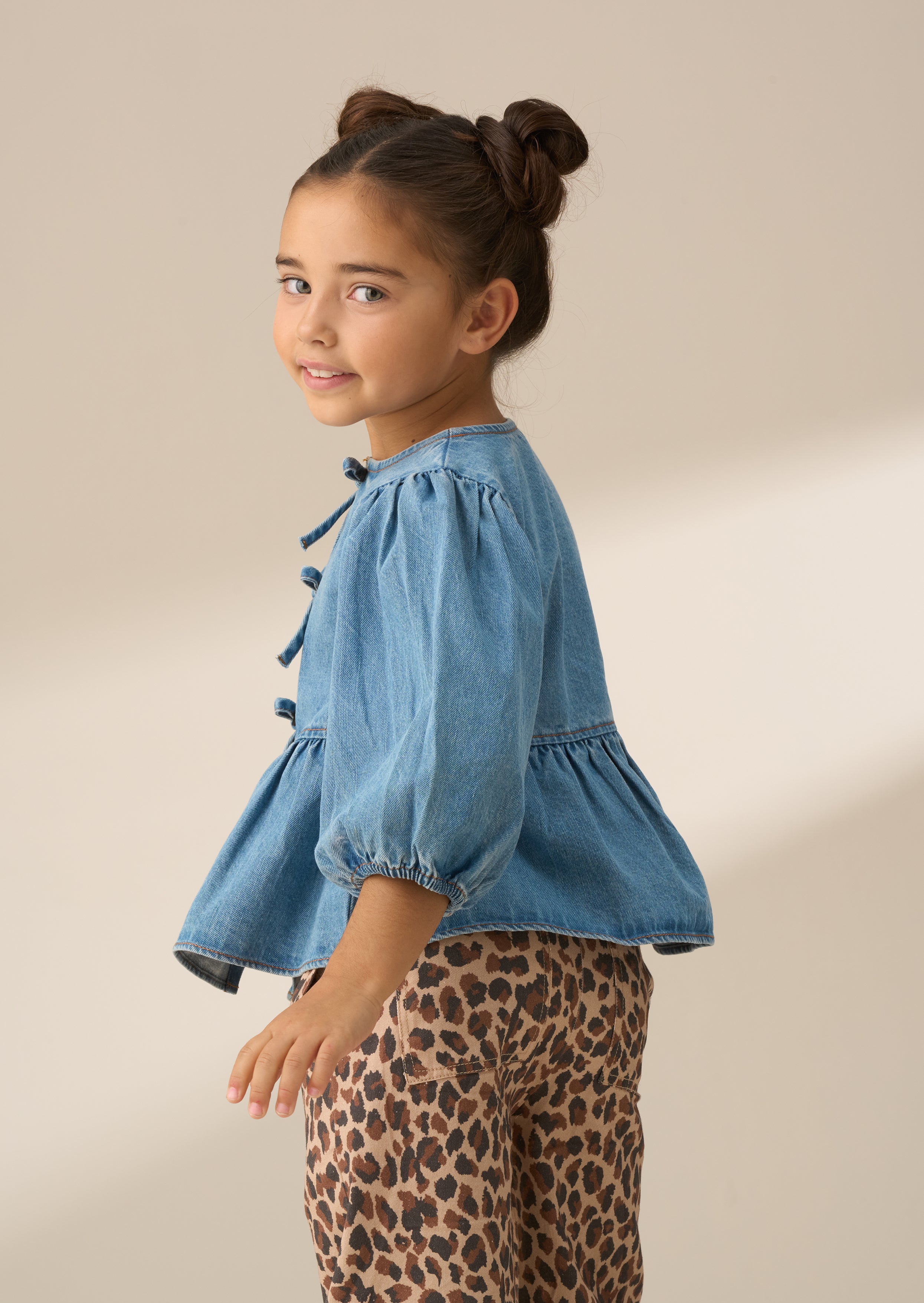 Top de lazo peplum de mezclilla azul Rochelle