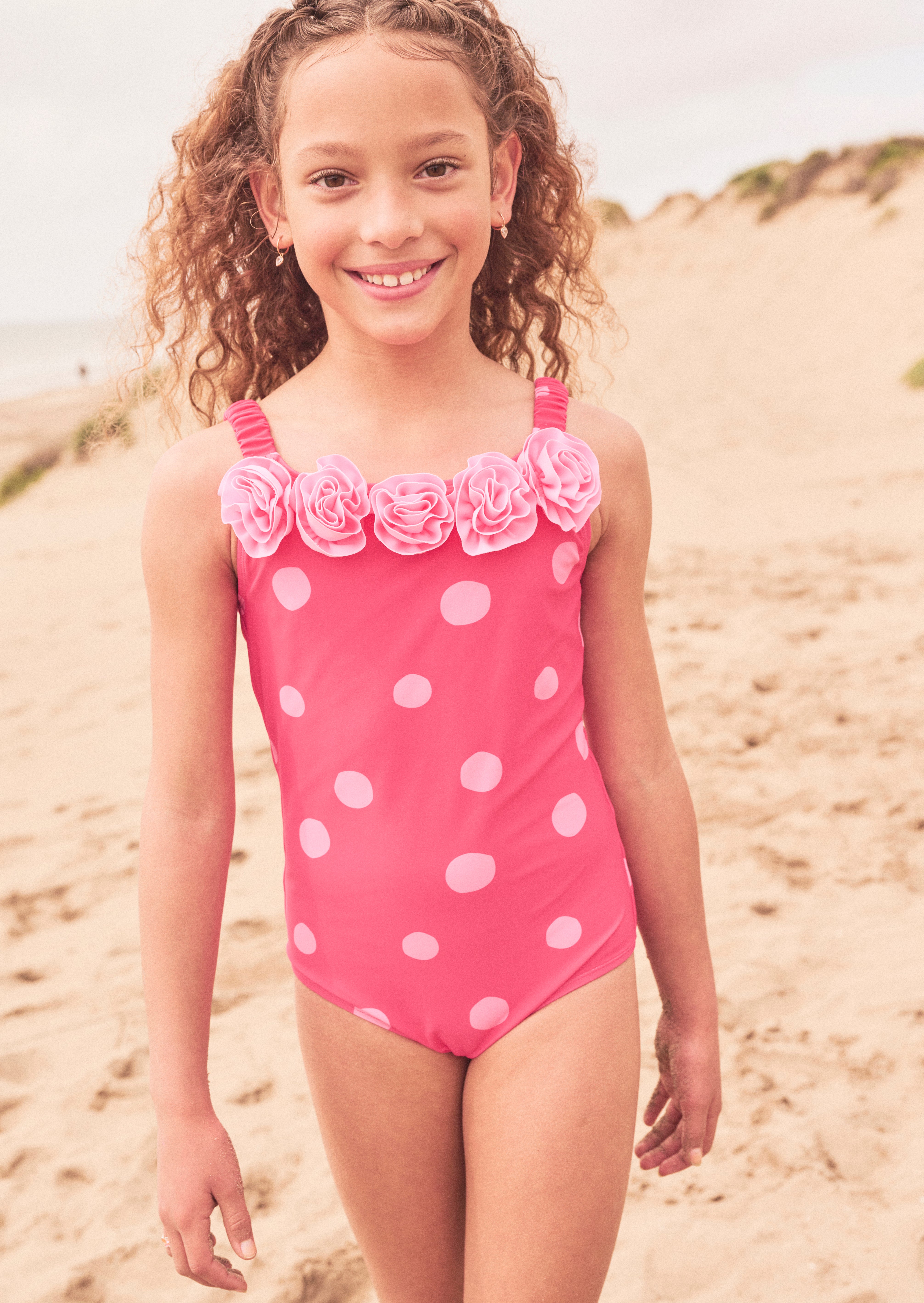 Costume da bagno Amara con stampa a pois e volant