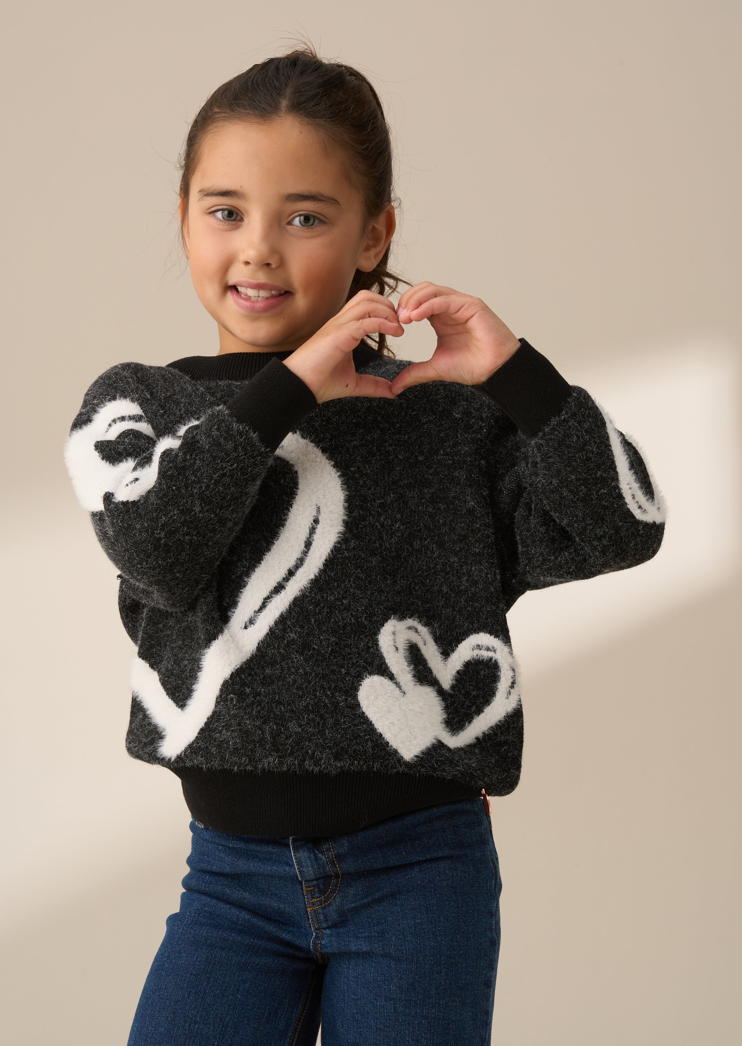 Pull Zara noir à cœur