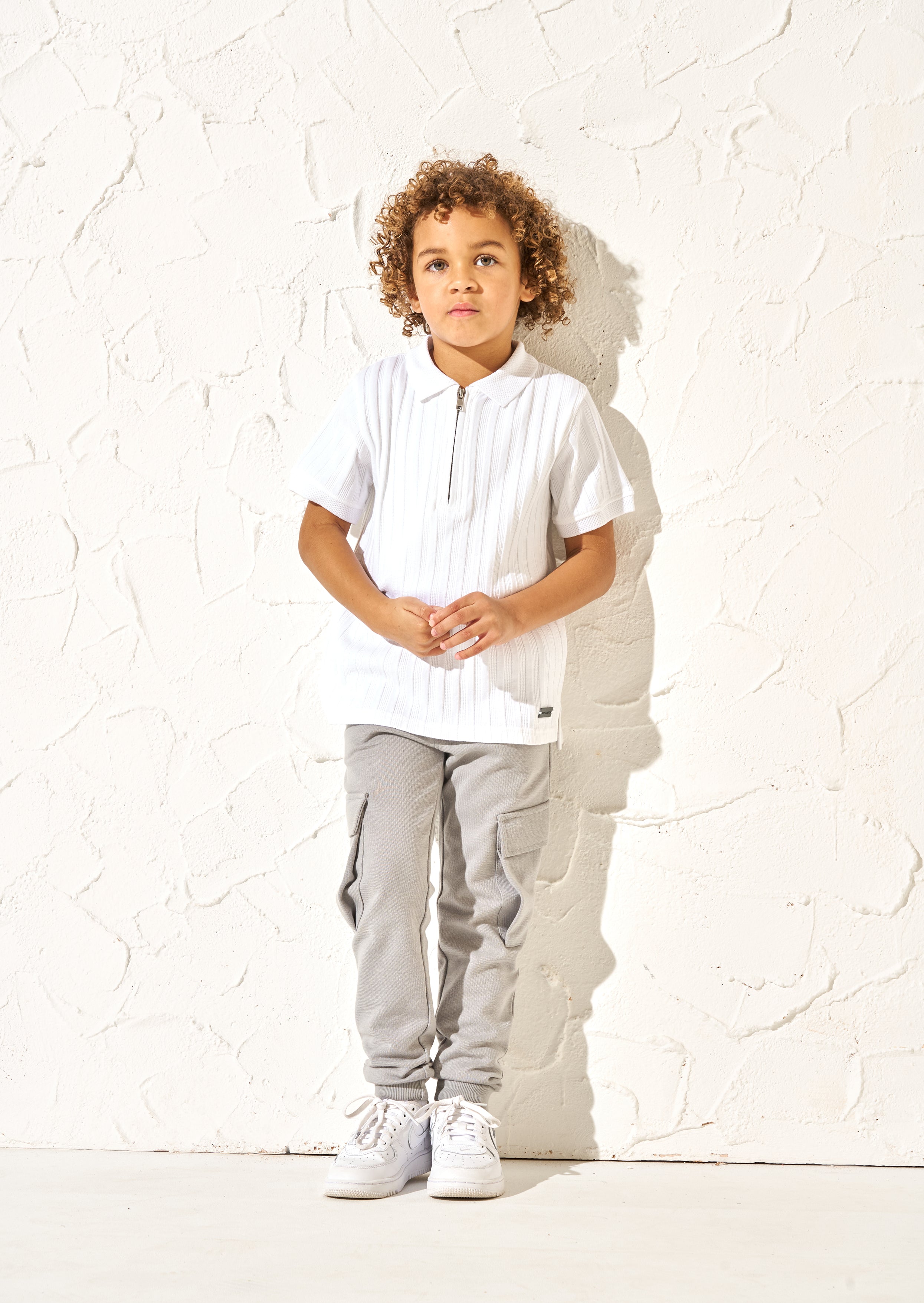 Hartley strukturiertes Rippen-Quarter-Zip-Poloshirt