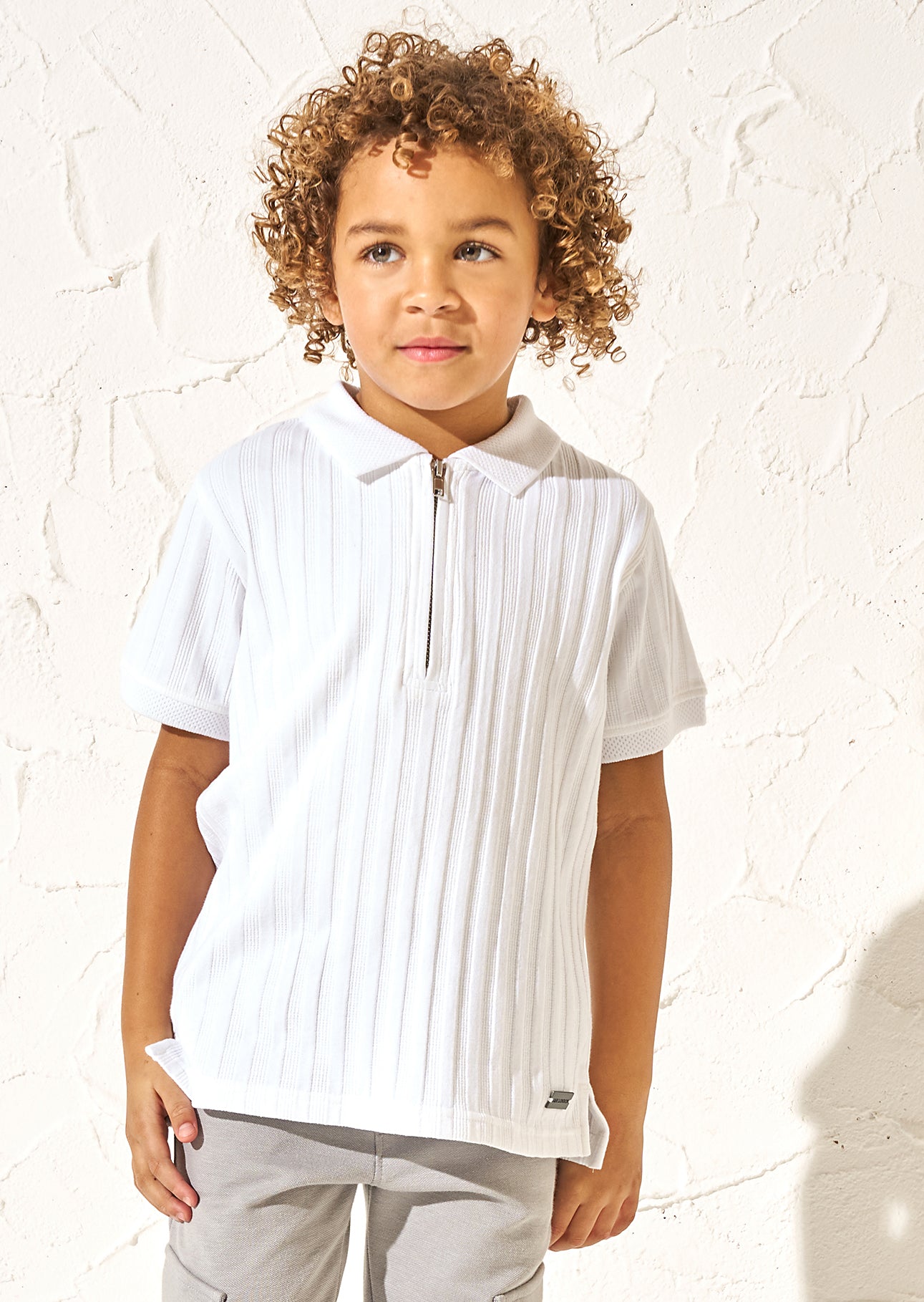 Hartley strukturiertes Rippen-Quarter-Zip-Poloshirt