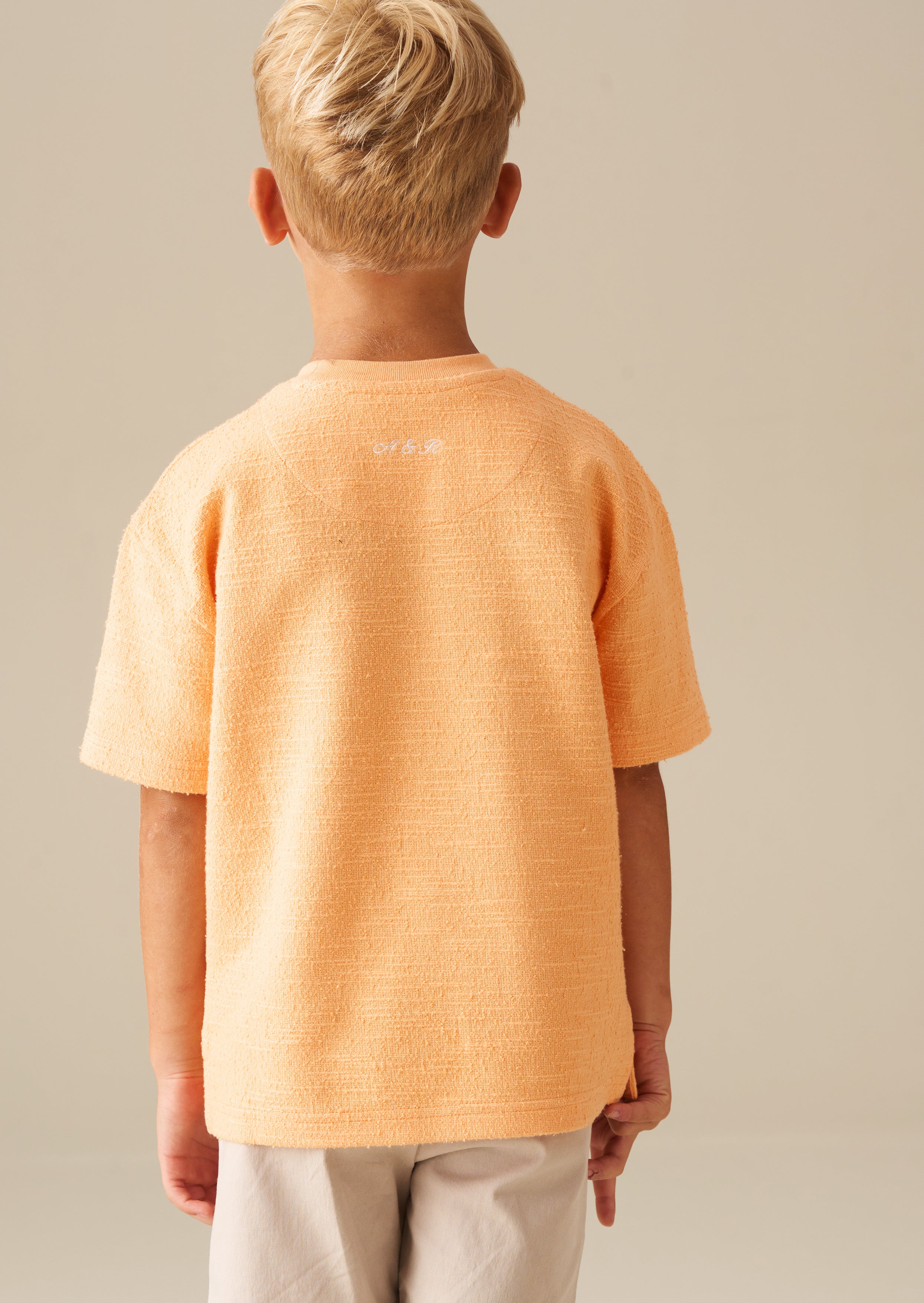 Camiseta texturizada naranja Parker