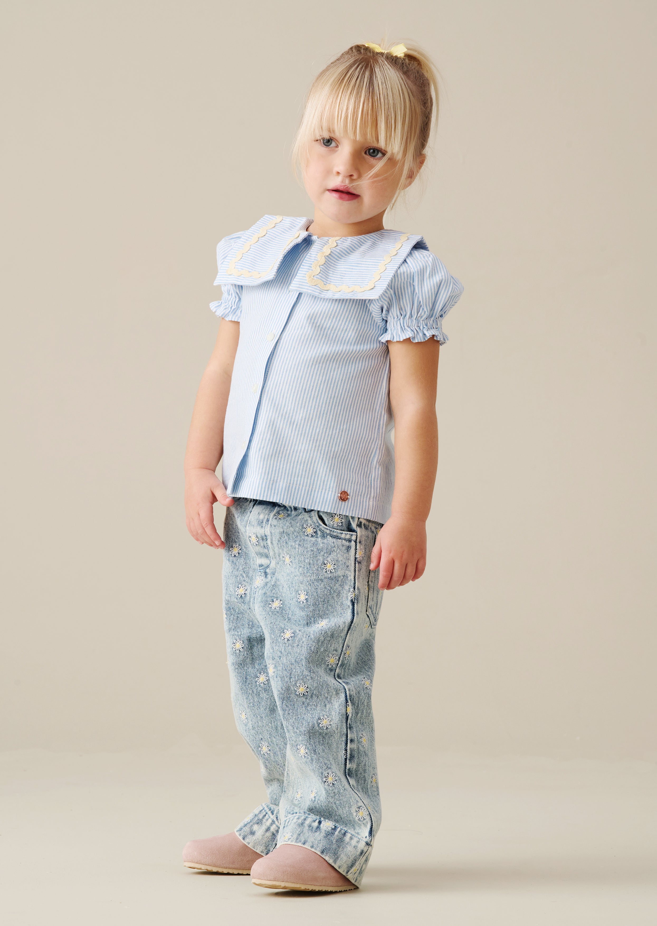 توب مارجو بياقة ريك راك مخططة