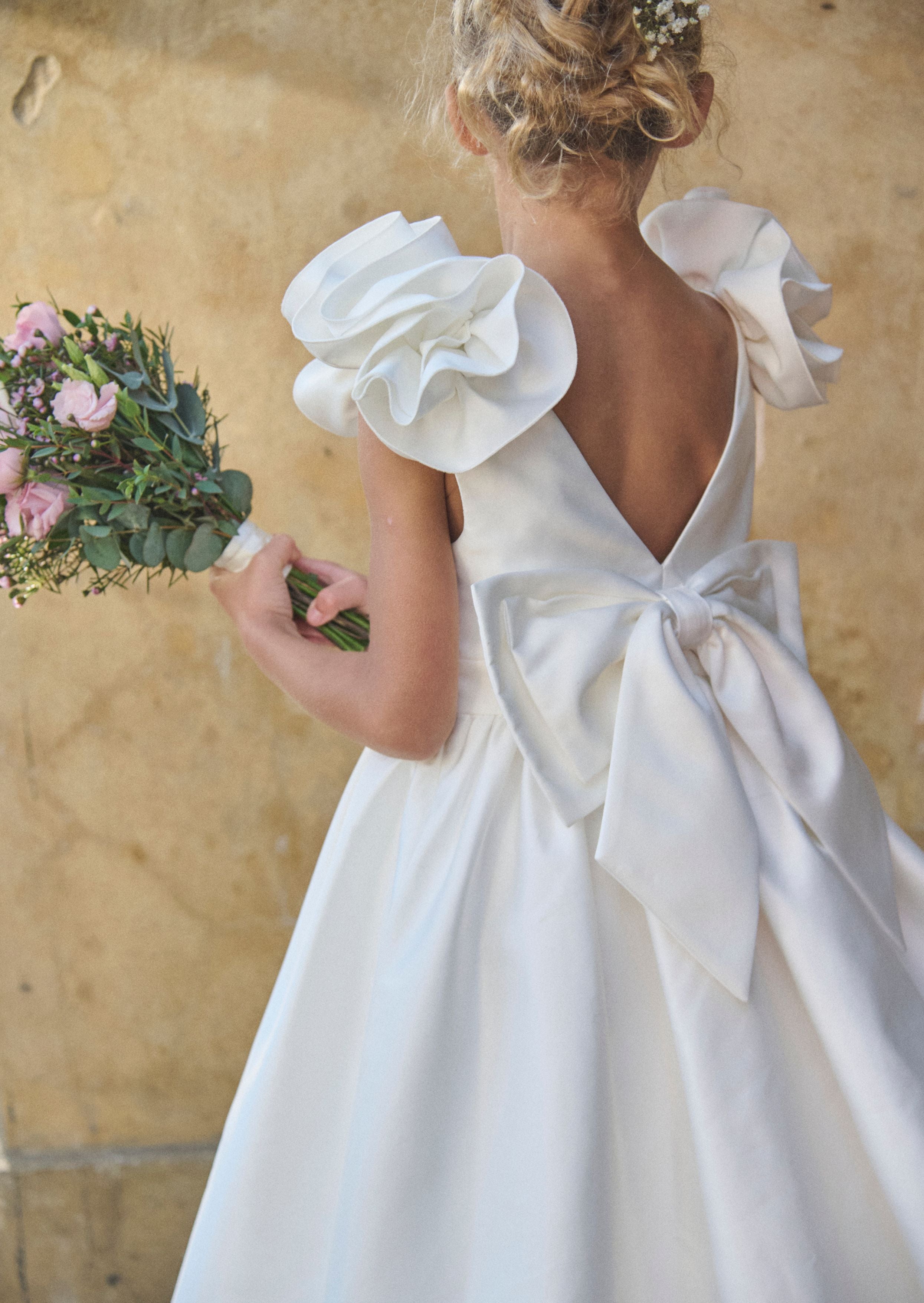 Robe Coco à manches bouffantes avec nœud dans le dos