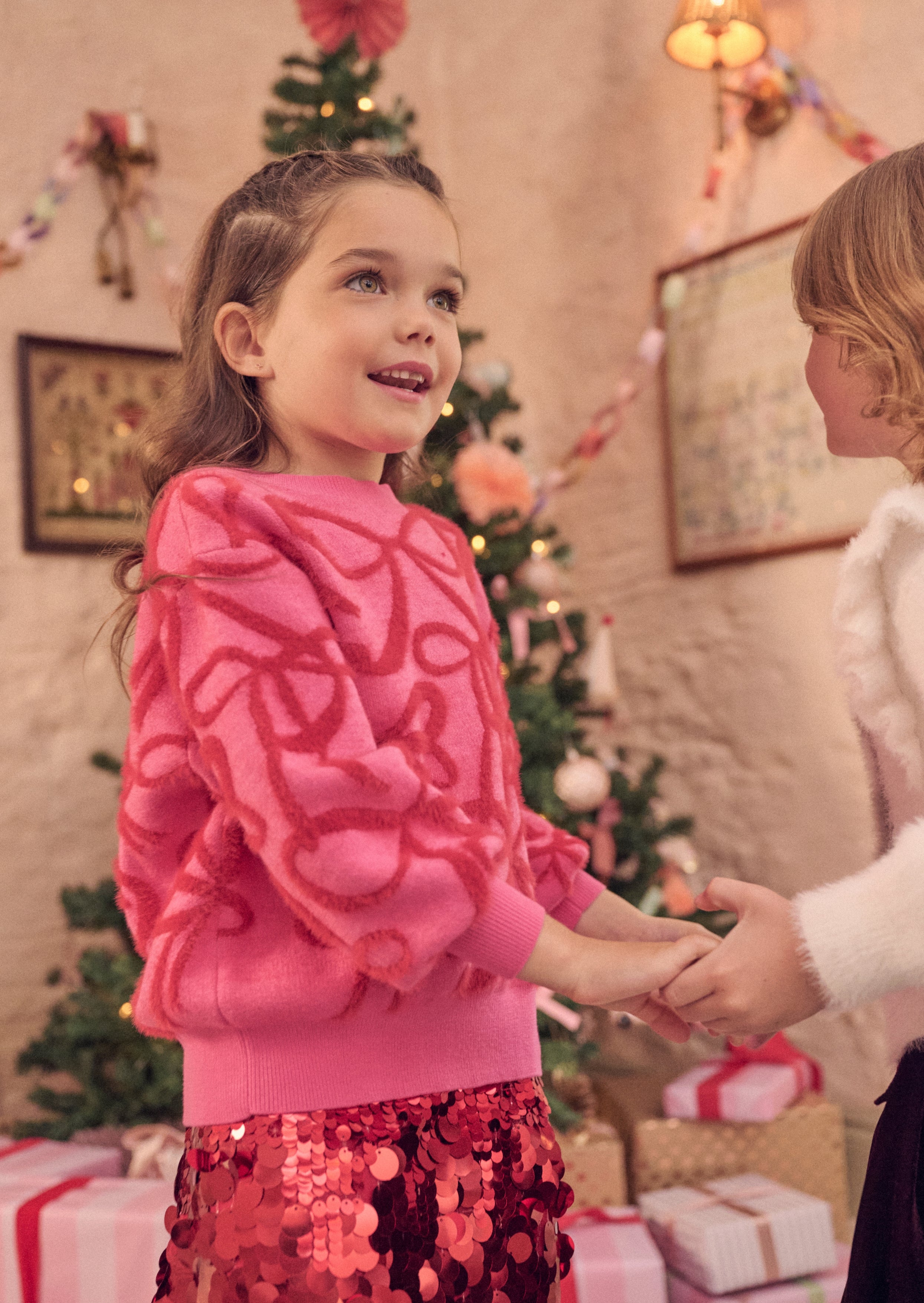 Girls Pink Fluffy Jumper with Red Bows | Angel & Rocket