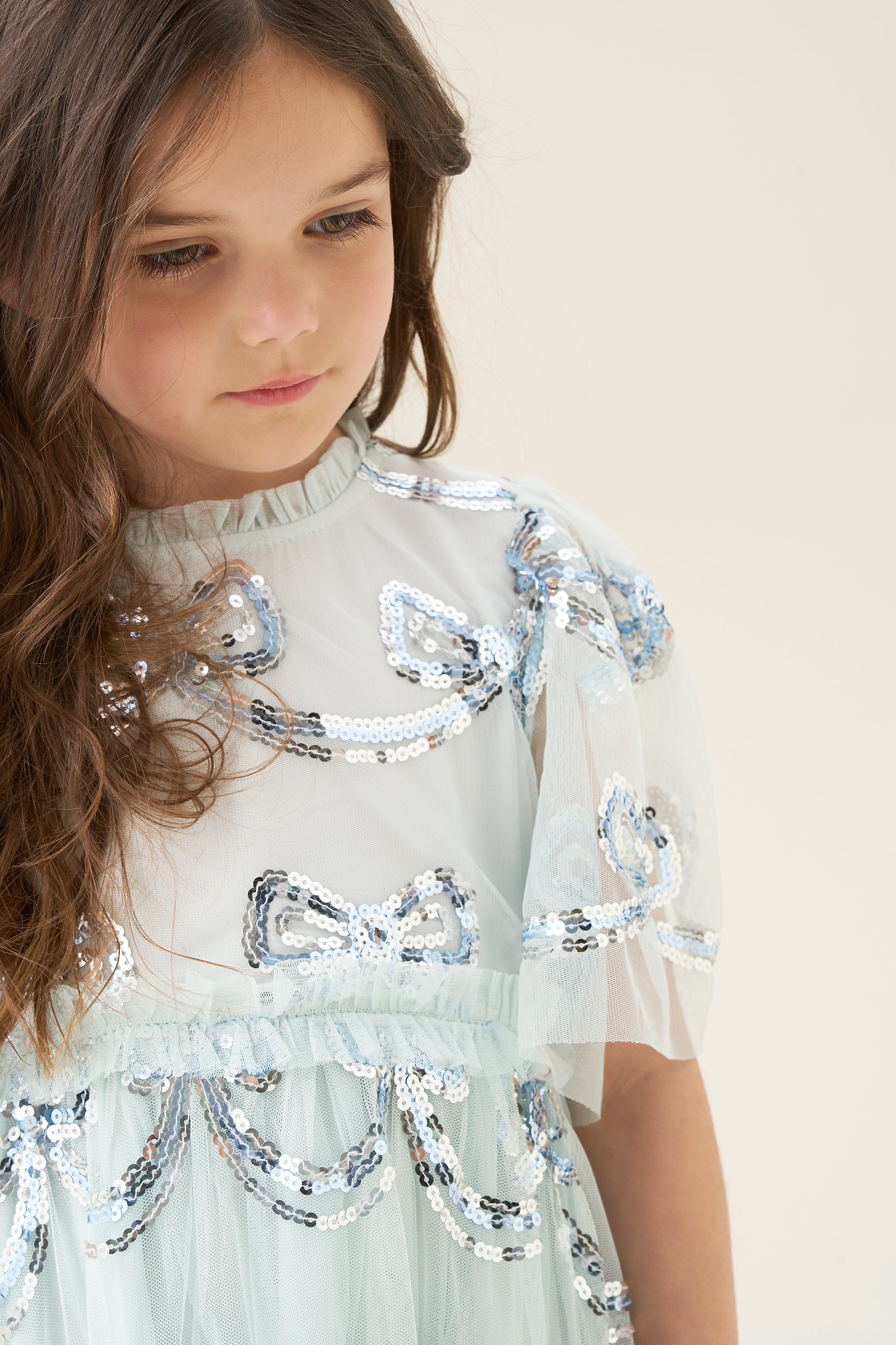 Robe en maille à nœud pailleté Delta Mint