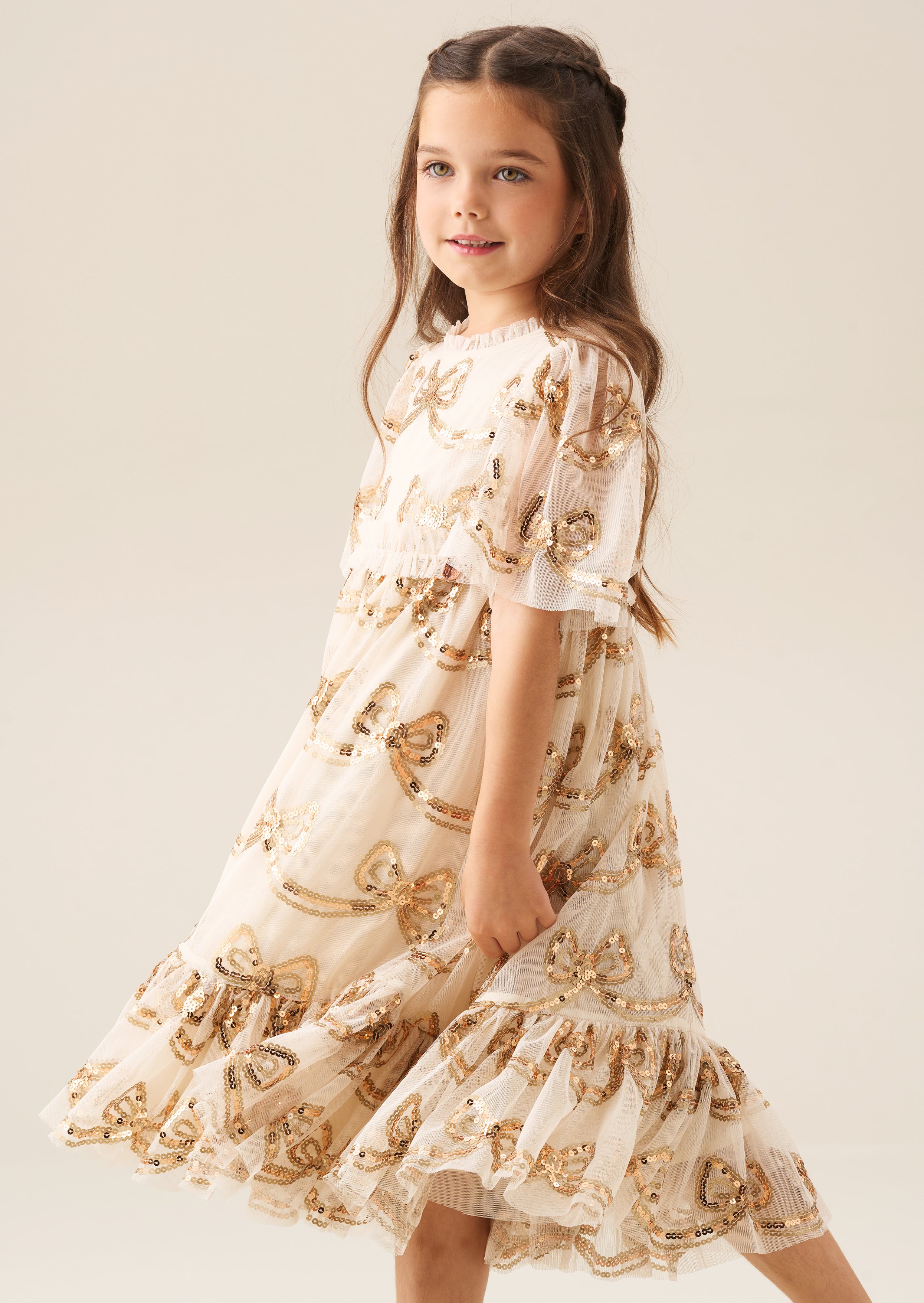 Vestido con lazo de lentejuelas color champán Delta