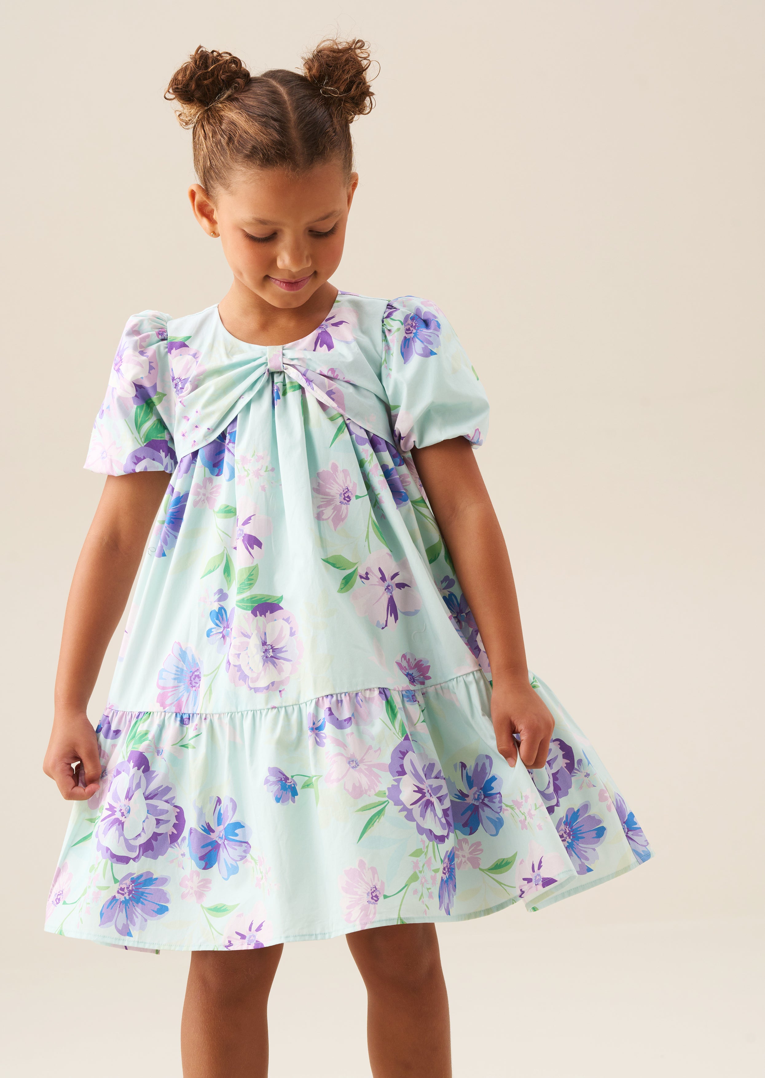 Robe Lucia à manches bouffantes avec nœud devant