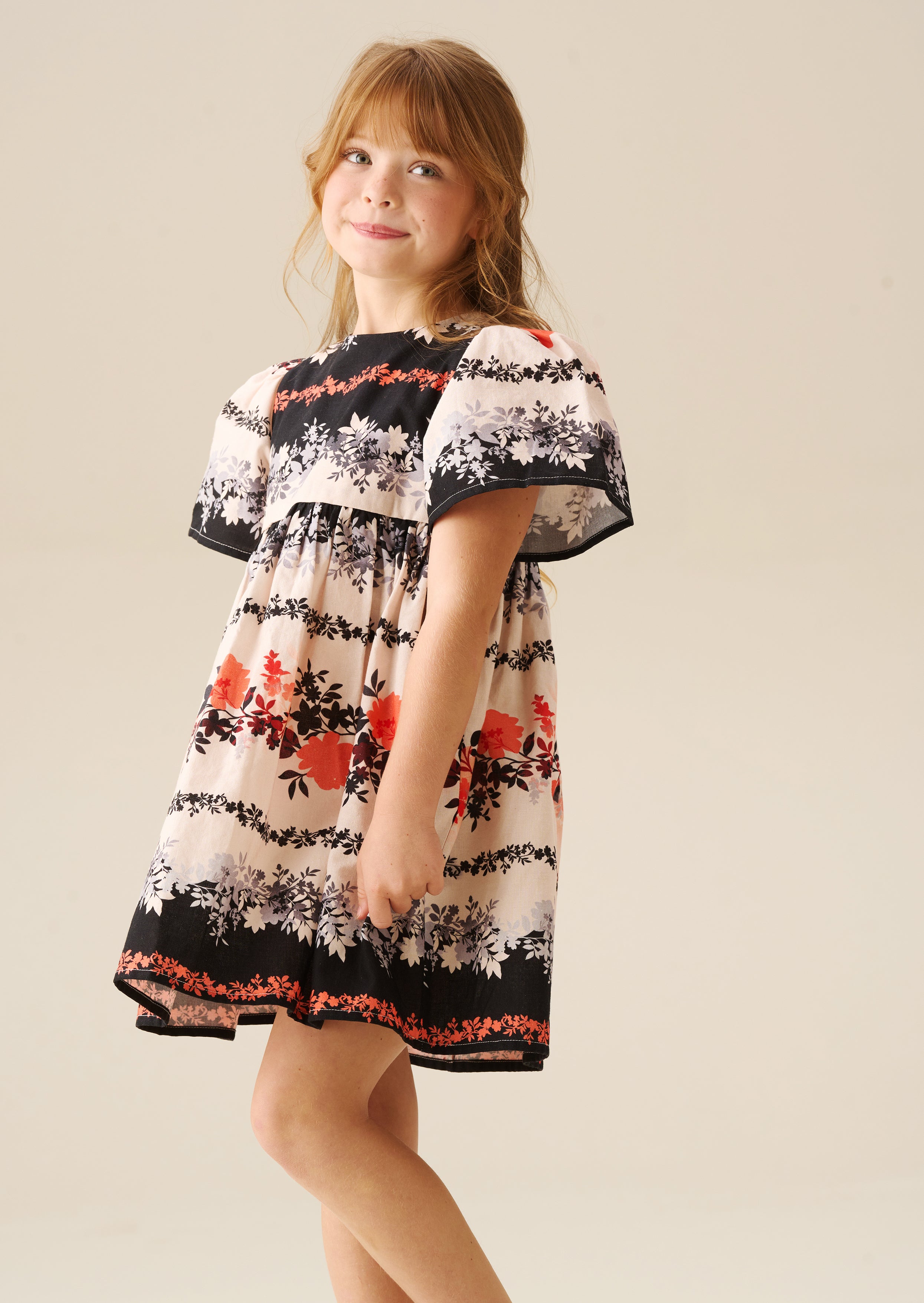 فستان رينا متعدد الطباعات ذو تأرجح