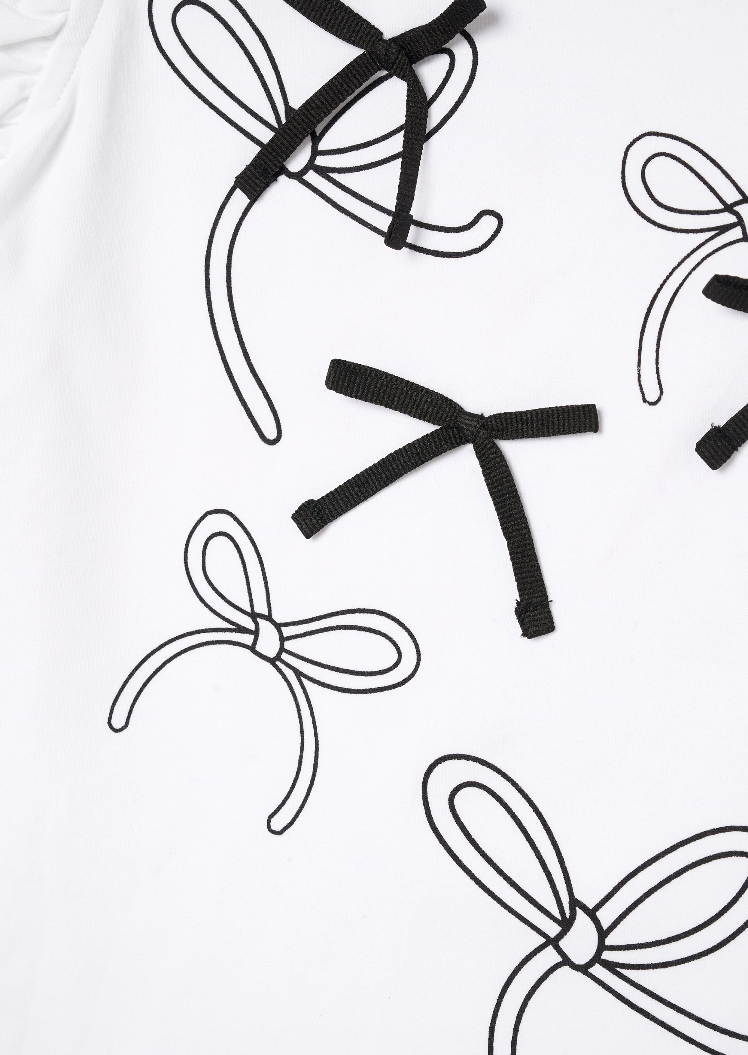 T-shirt à manches bouffantes orné d'un nœud blanc Aofie