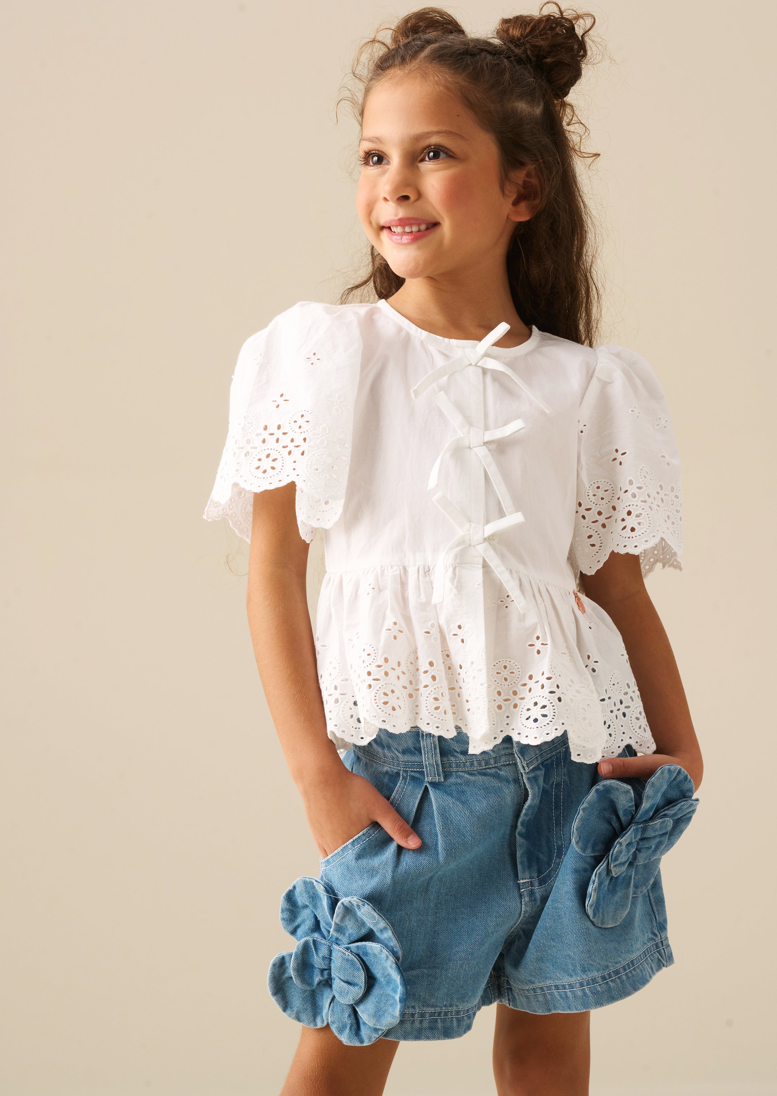 Ria Broderie Tie Front Peplum Top