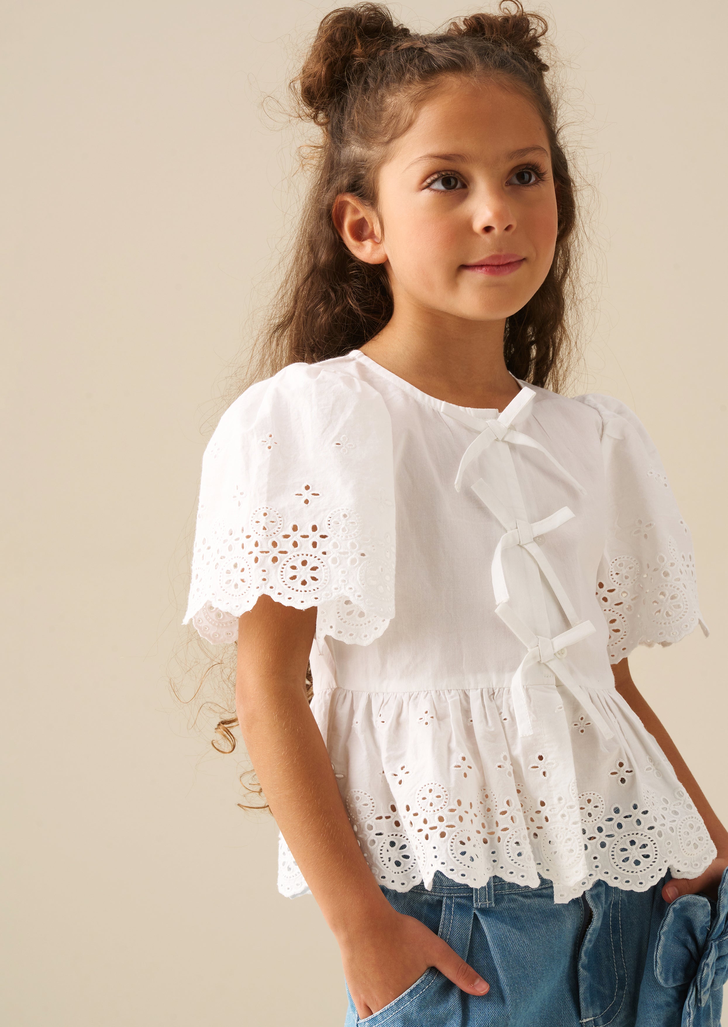 Ria Broderie Tie Front Peplum Top