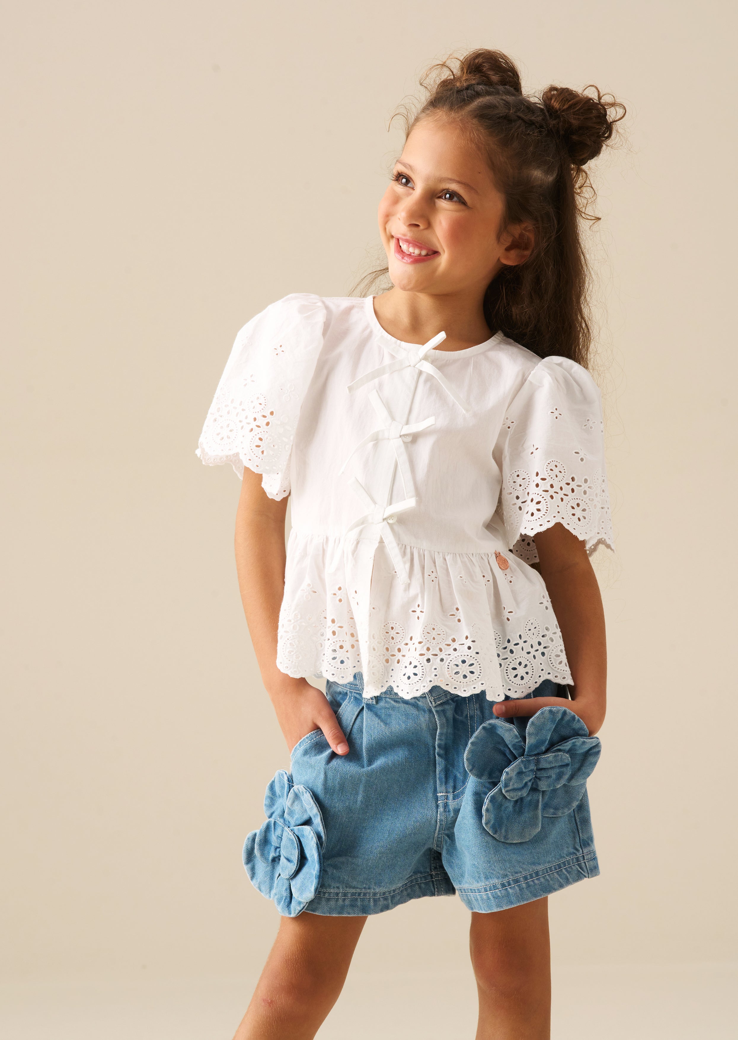 Ria Broderie Tie Front Peplum Top