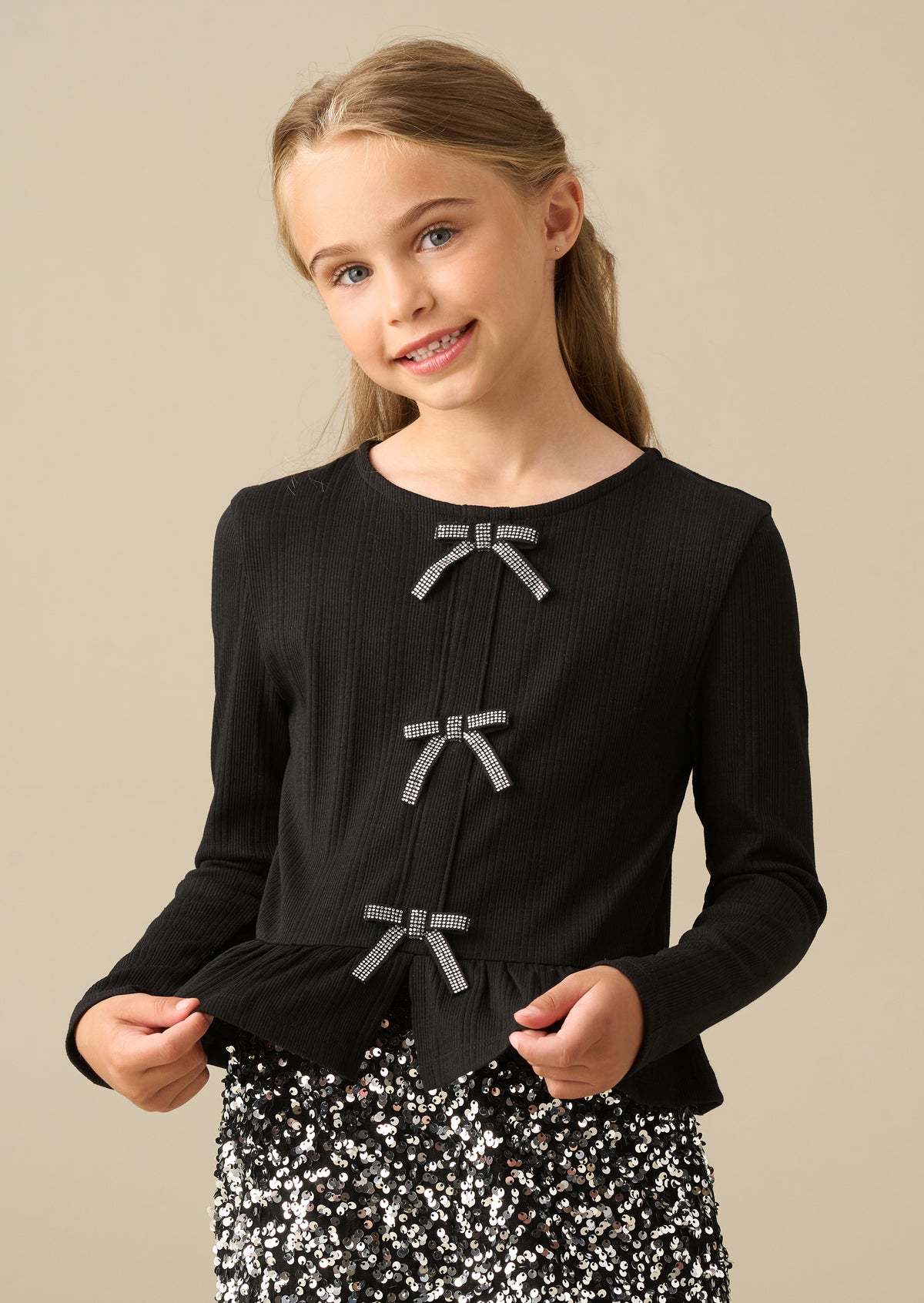Rona Black Peplum Long Sleeve Bow Top