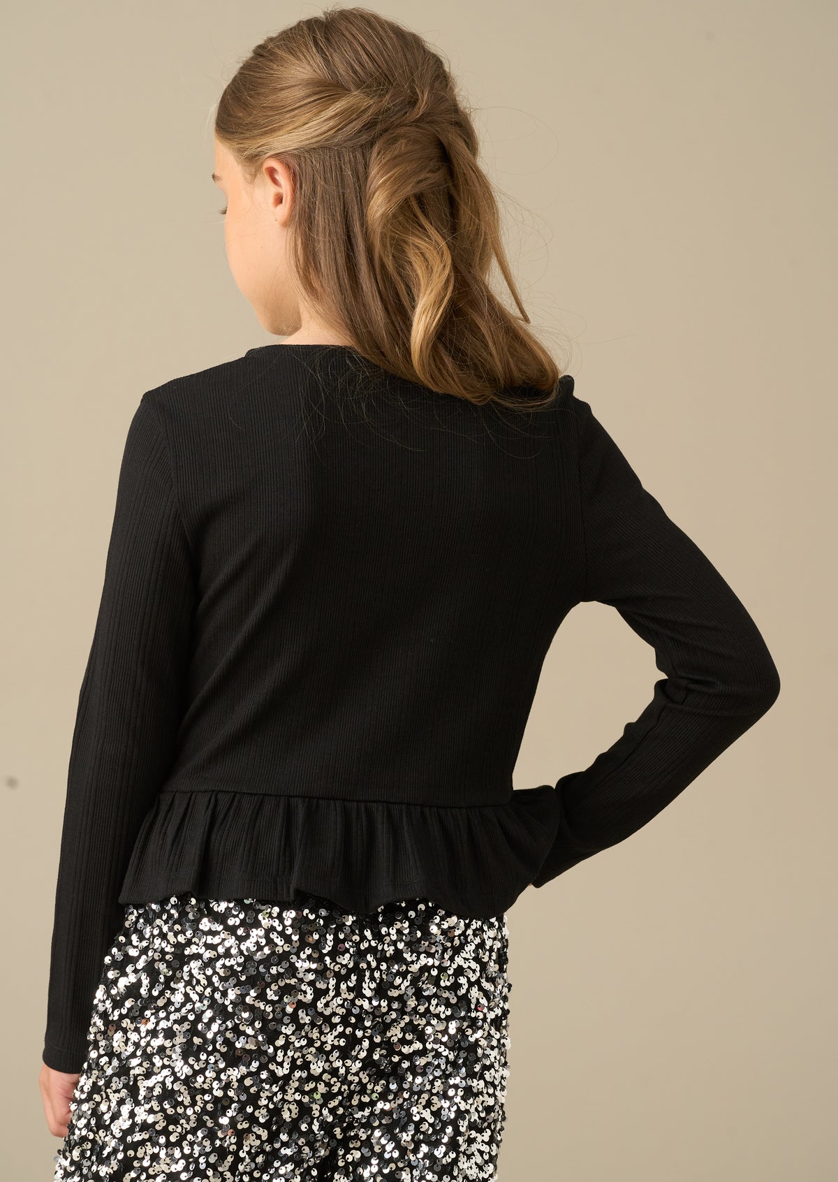 Rona Black Peplum Long Sleeve Bow Top