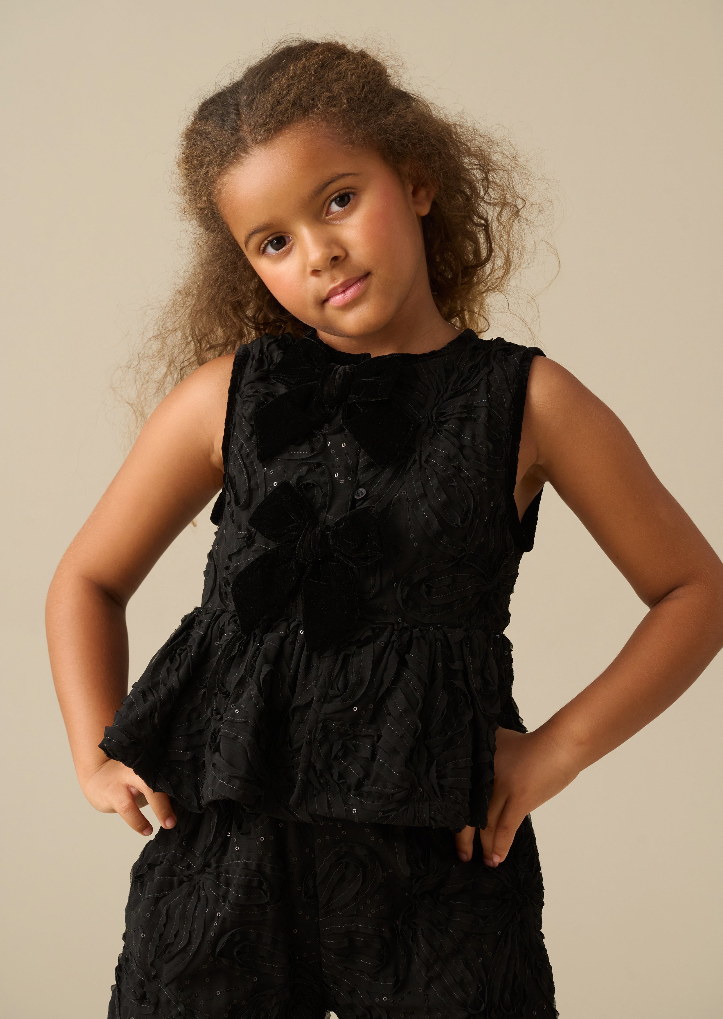 Mara Embellished Bow Peplum Top