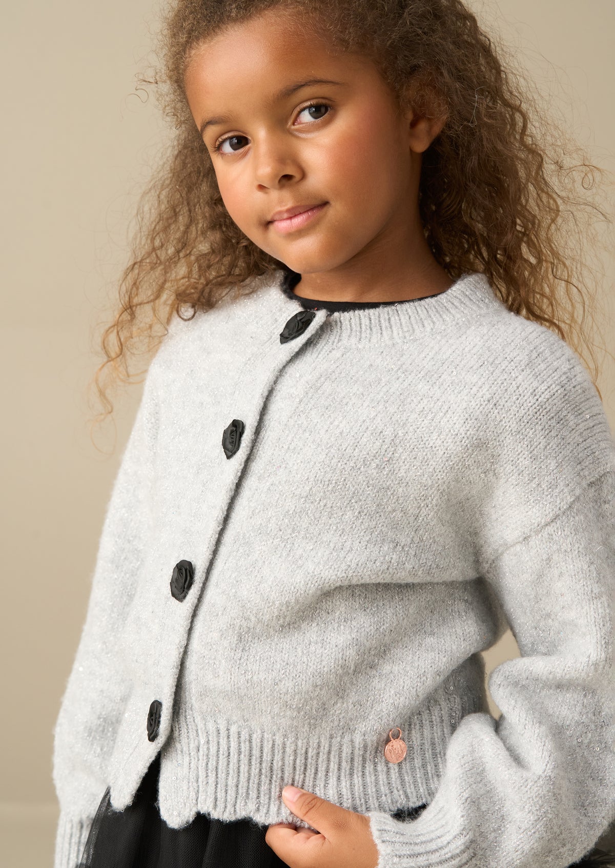 Elory Strick-Cardigan mit Pailletten und Muschelrosen