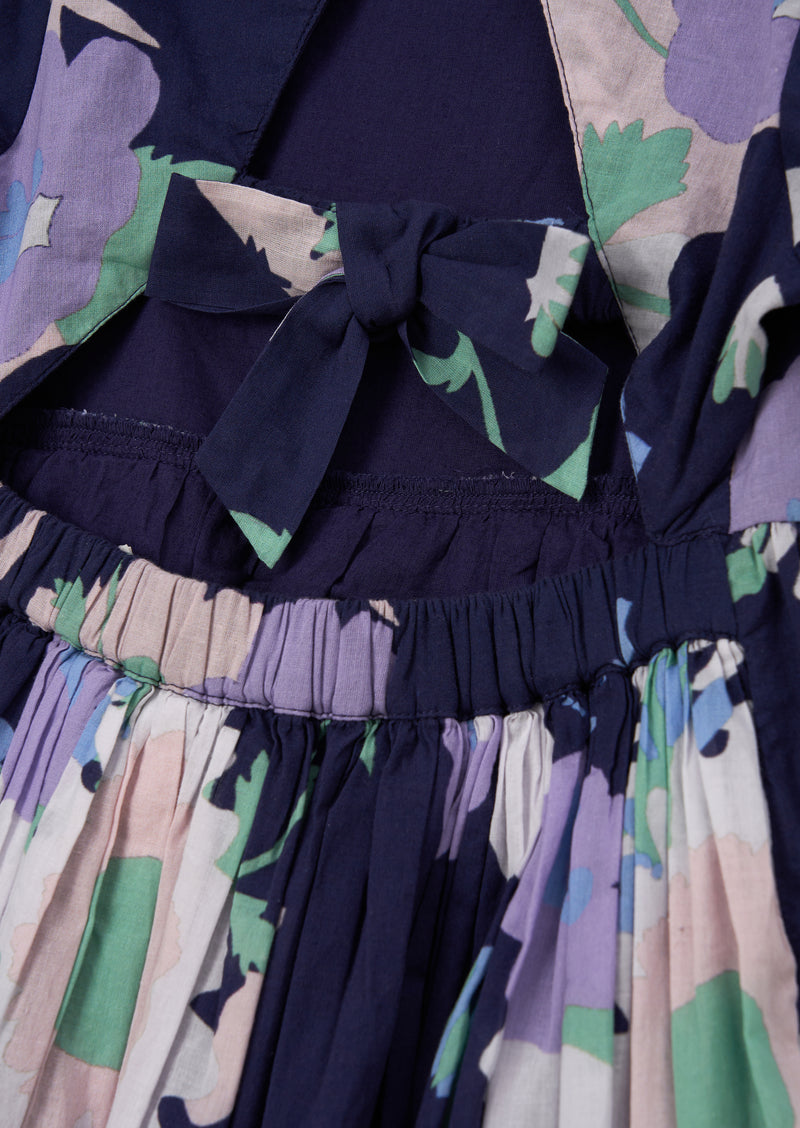 فستان إيفيتا بطبعة الزهور مع أربطة متعددة على الظهر