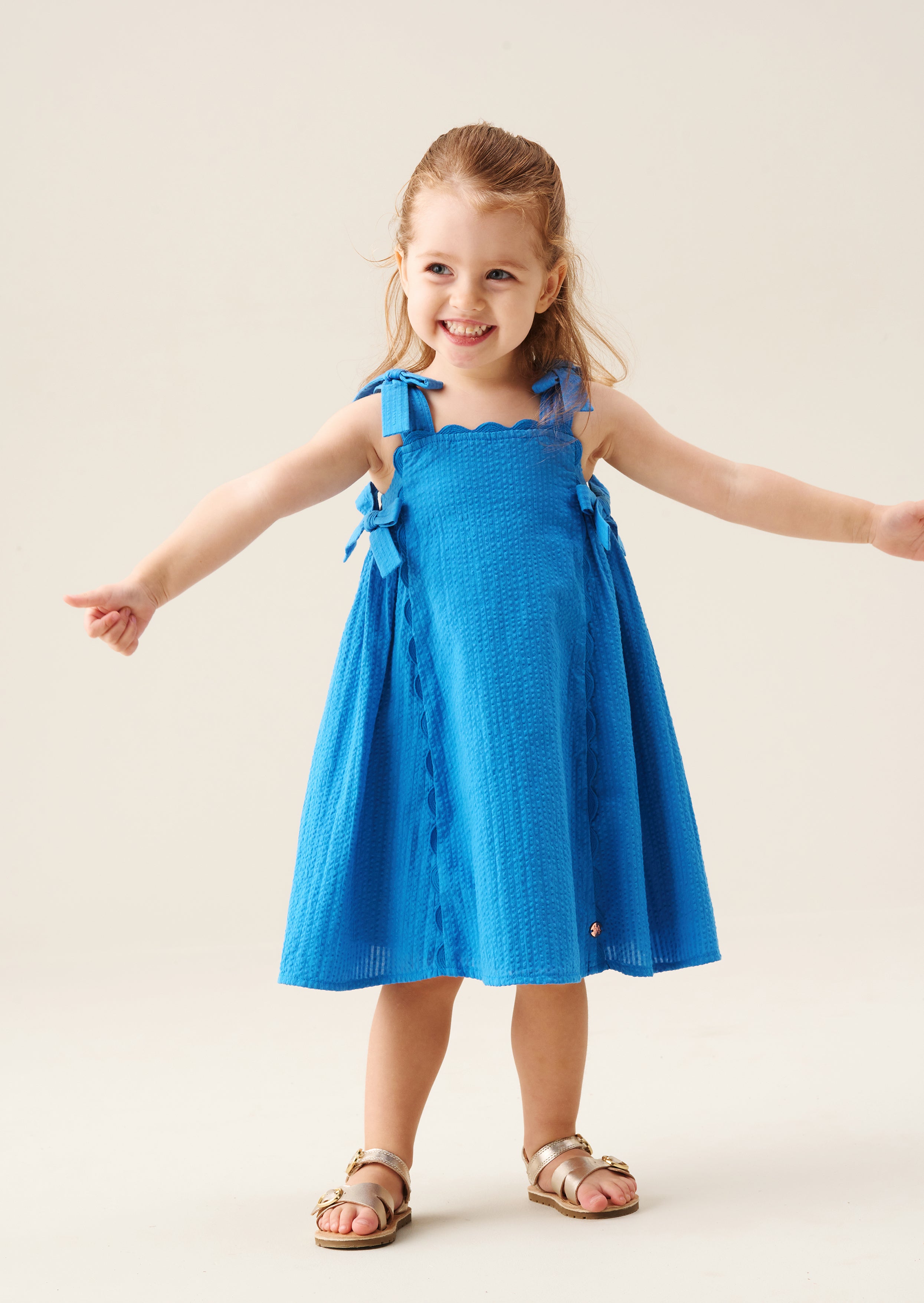 Vestido Matilda Azul con Lazo y Borde Ondulado