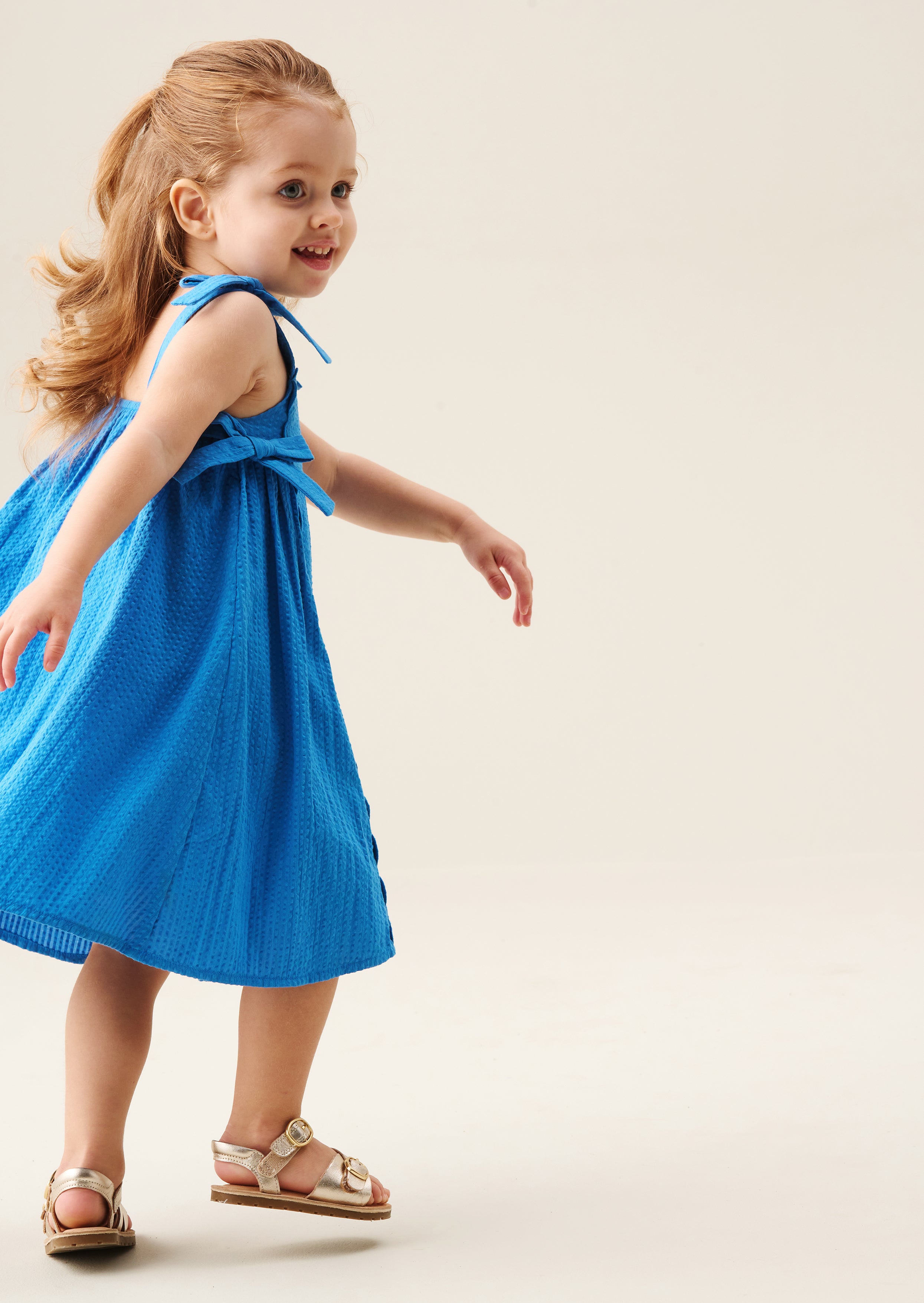 Vestido Matilda Azul con Lazo y Borde Ondulado